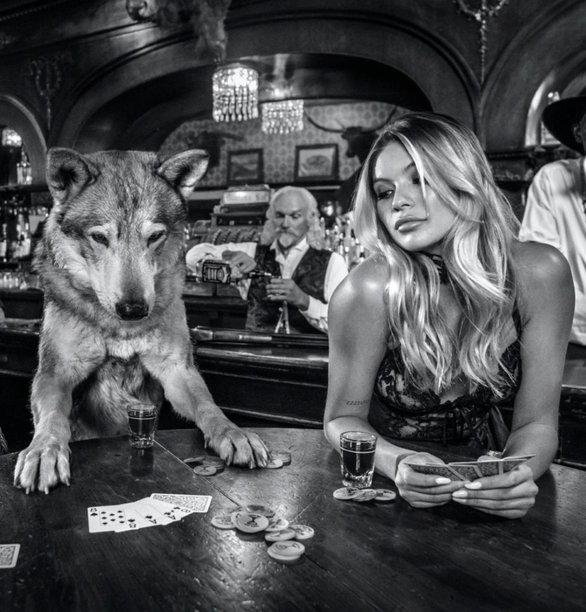 Aces and Eights / Sexy Framed Western Photo Josie Canseco in Montana Salloon - Contemporary Photograph by David Yarrow