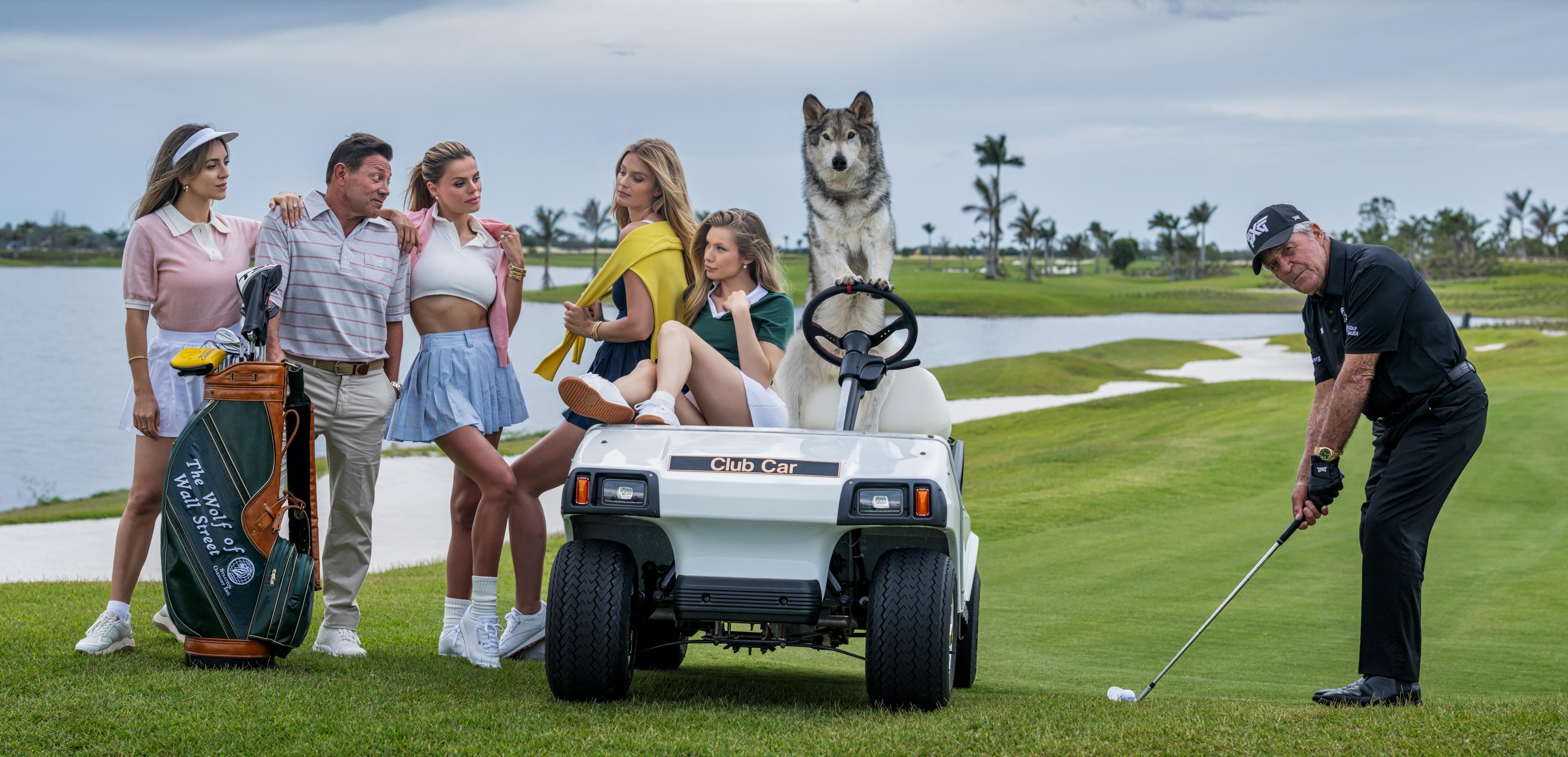 Age is just a number - Golf with Wolf and Women, Fine Art Photography, 2025 - Gray Figurative Photograph by David Yarrow