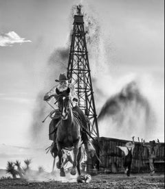 'Black Gold' - Man galopping in front of an oil farm, fine art photography, 2023