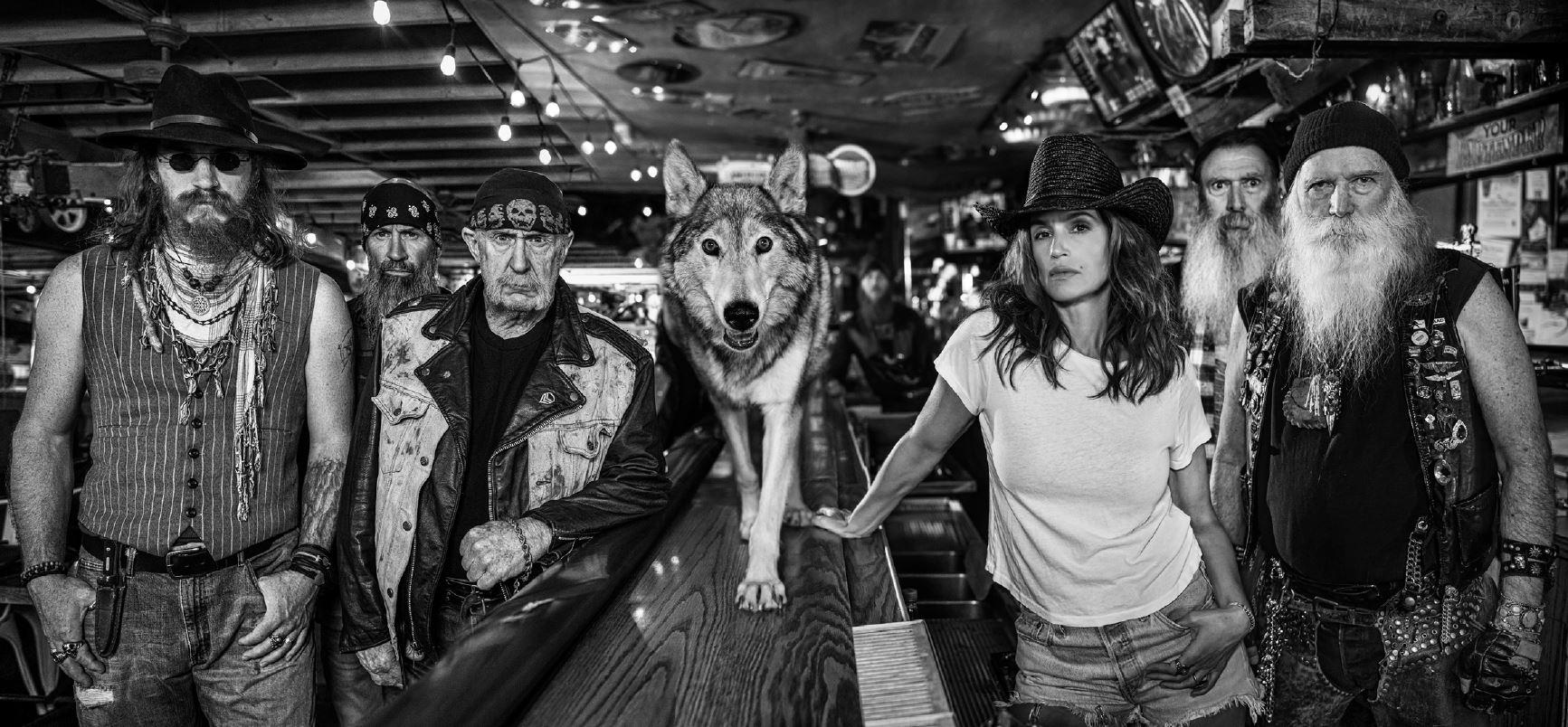 'Breaking Bad' - Barscene with wolf, fine art photography, 2023 - Contemporary Photograph by David Yarrow