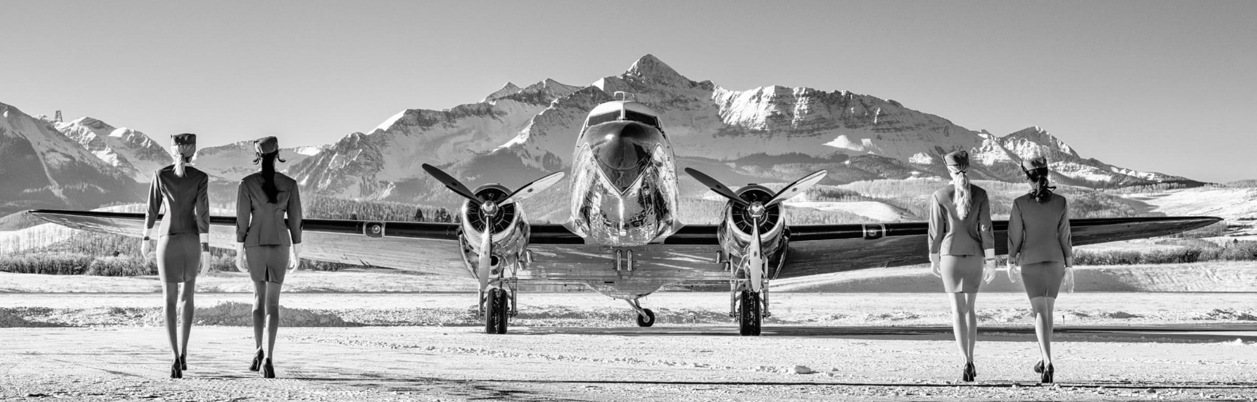 David Yarrow Black and White Photograph - 'Come fly with me' - silver airplaine in Telluride , fine art photography, 2023