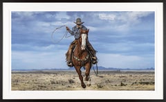 David Yarrow: „True Grit“-Fotografie eines Cowboys auf Pferd mit Lasso
