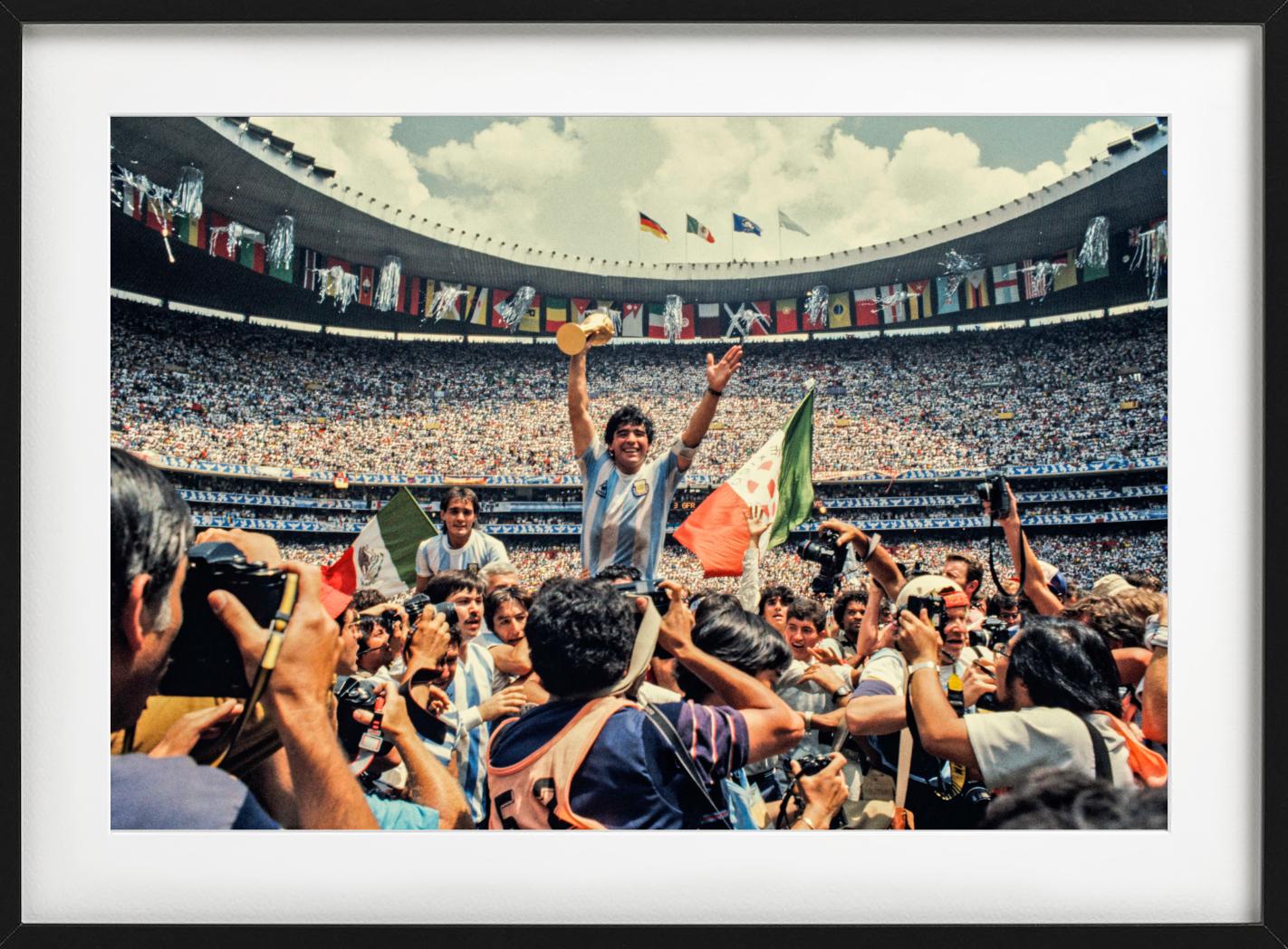 Diego Maradona after winning the world cup in 1986, captured by David Yarrow on Film.

All prints are limited edition. Available in multiple sizes. High-end framing on request.

All prints are done and signed by the artist. The collector receives an