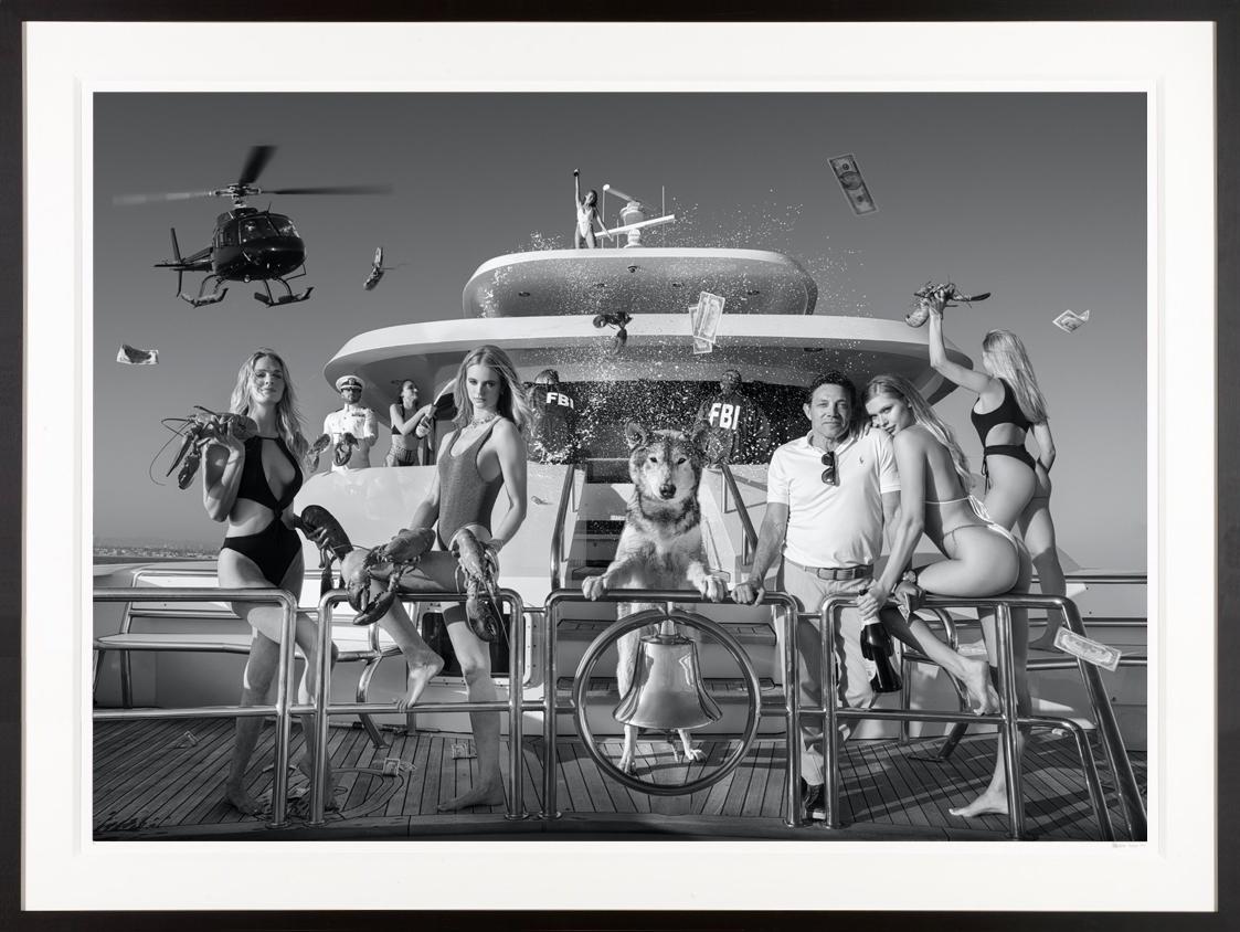 David Yarrow Black and White Photograph - Get the F**k Off My Boat / Jordan Belfort & Josie Canseco / Wolf of Wall Street