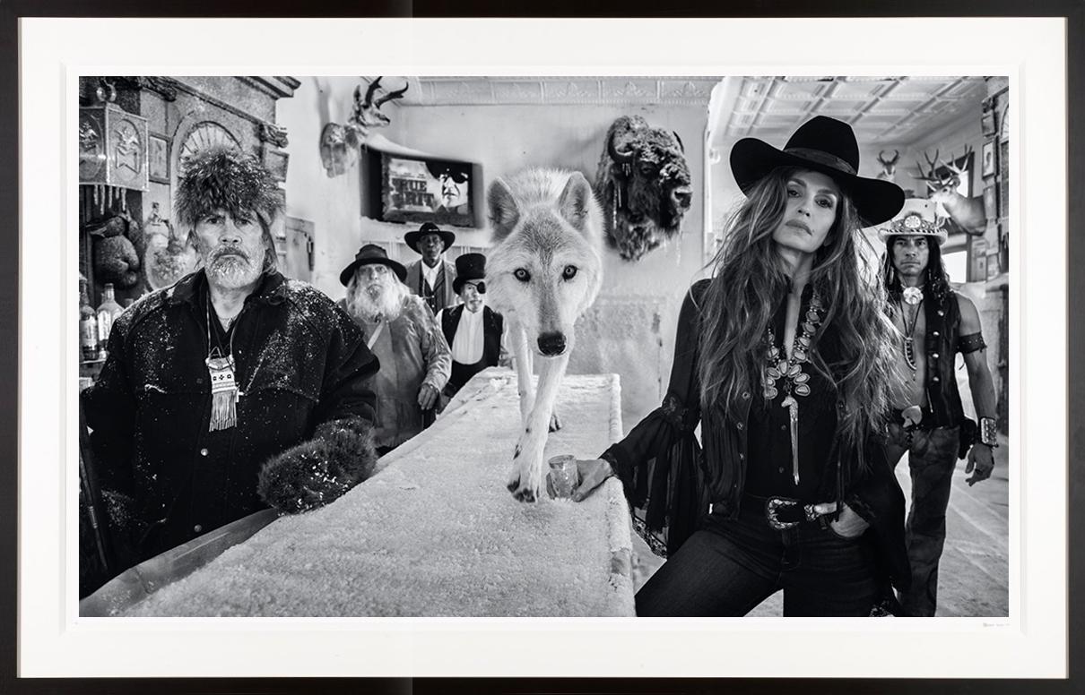 David Yarrow Black and White Photograph - "Hostiles" Sexy Badass Cindy Crawford bar with Stunning Wolf