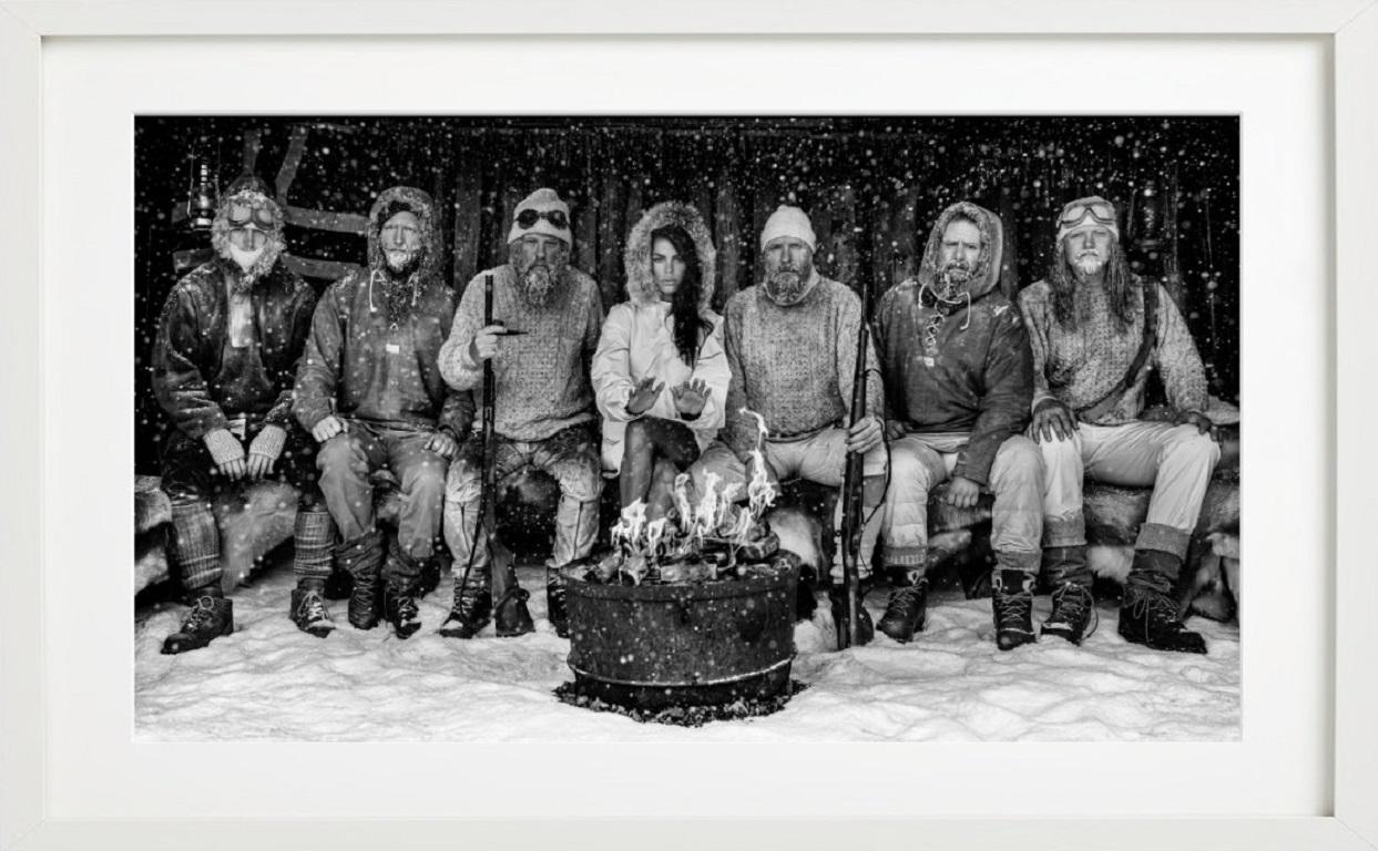 Ice Ice Baby - Model Brooks Nader with Polar Explorers Sitting Around Fireplace For Sale 1