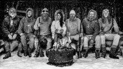 Ice Ice Baby - Model Brooks Nader with Polar Explorers Sitting Around Fireplace