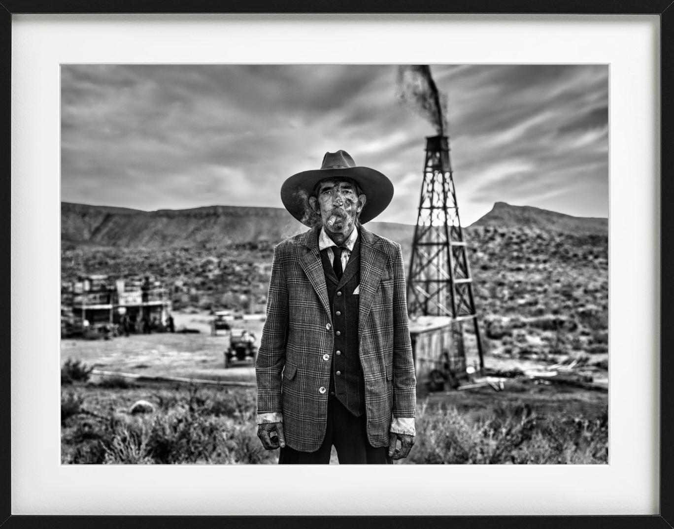 'I'm an Oil Man' - Old Man in front of Oil derrick, fine art photography, 2023 For Sale 1