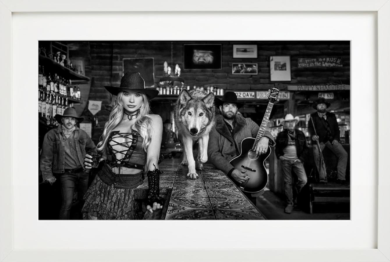 Pappy & Harriet's - Model and Wolf in old Bar, fine art photography, 2024 For Sale 3