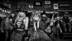 Pappy & Harriet's - Model and Wolf in old Bar, fine art photography, 2024
