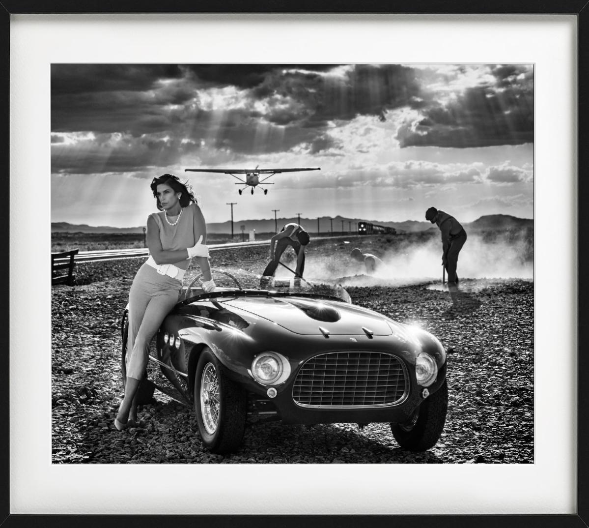 Planes, Trains and Automobiles - Supermodel Cindy Crawford with vintage Ferrari - Contemporary Photograph by David Yarrow