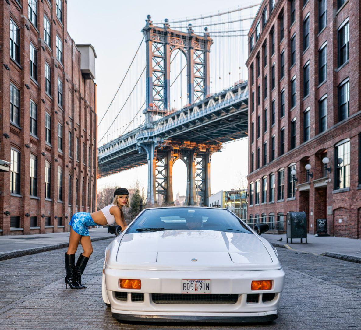 David Yarrow Figurative Photograph - Pretty Woman - Supermodel Brooks Nader leaning against a car, Brooklyn New York