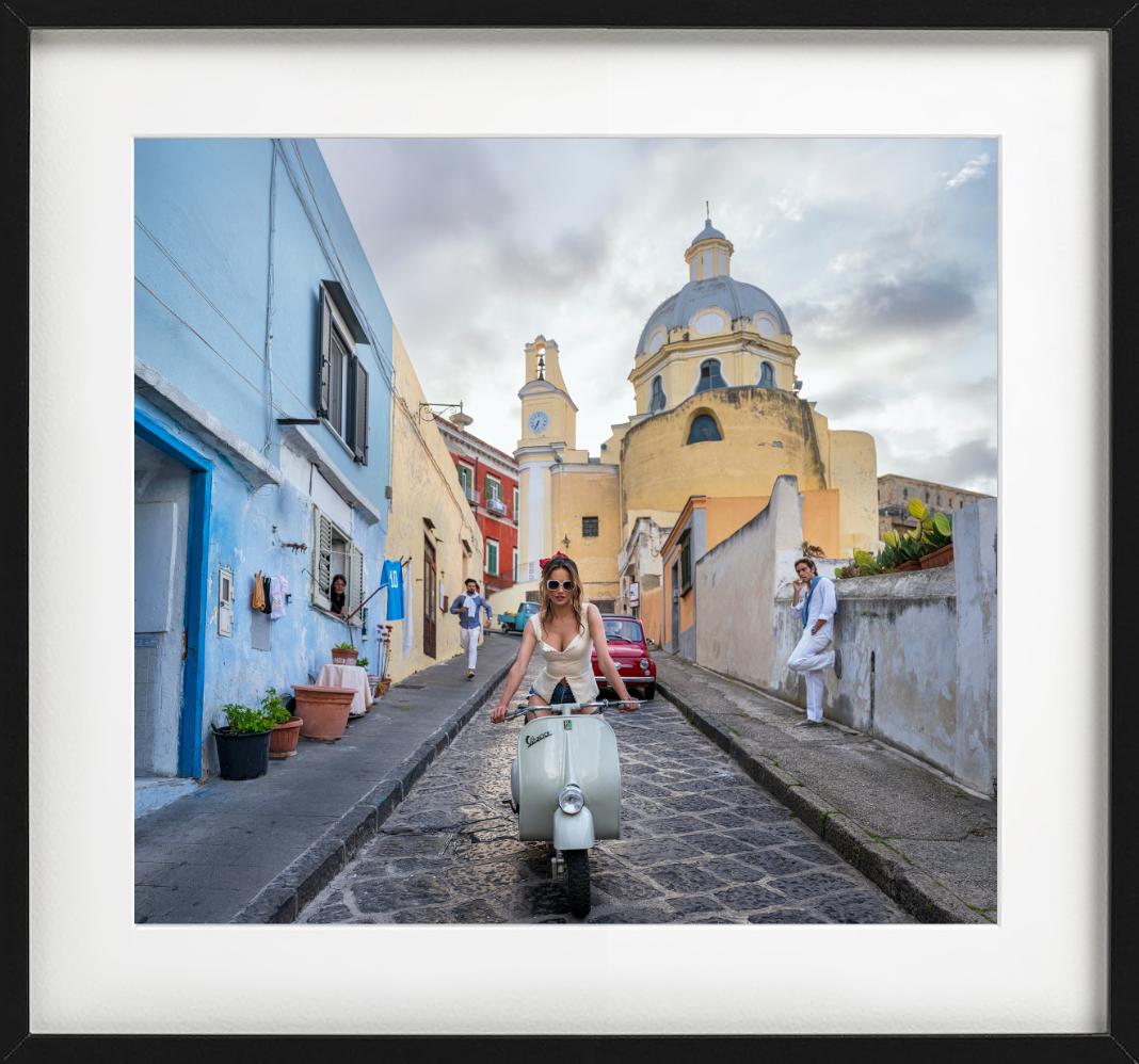 A woman riding her motorcycle through the streets of Procida, photographed by David Yarrow. Available in black and white and color.  

All prints are limited edition. Available in multiple sizes. High-end framing on request.

All prints are done and