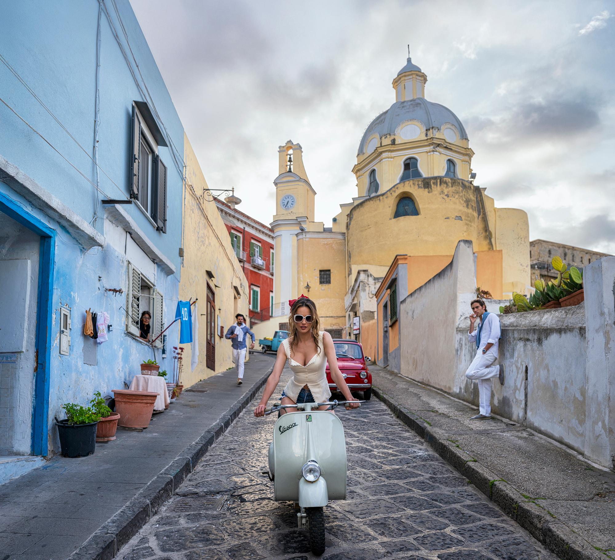 David Yarrow Figurative Photograph - The Girl On The Vespa - A Woman Riding Through Town, Fine Art Photography, 2025