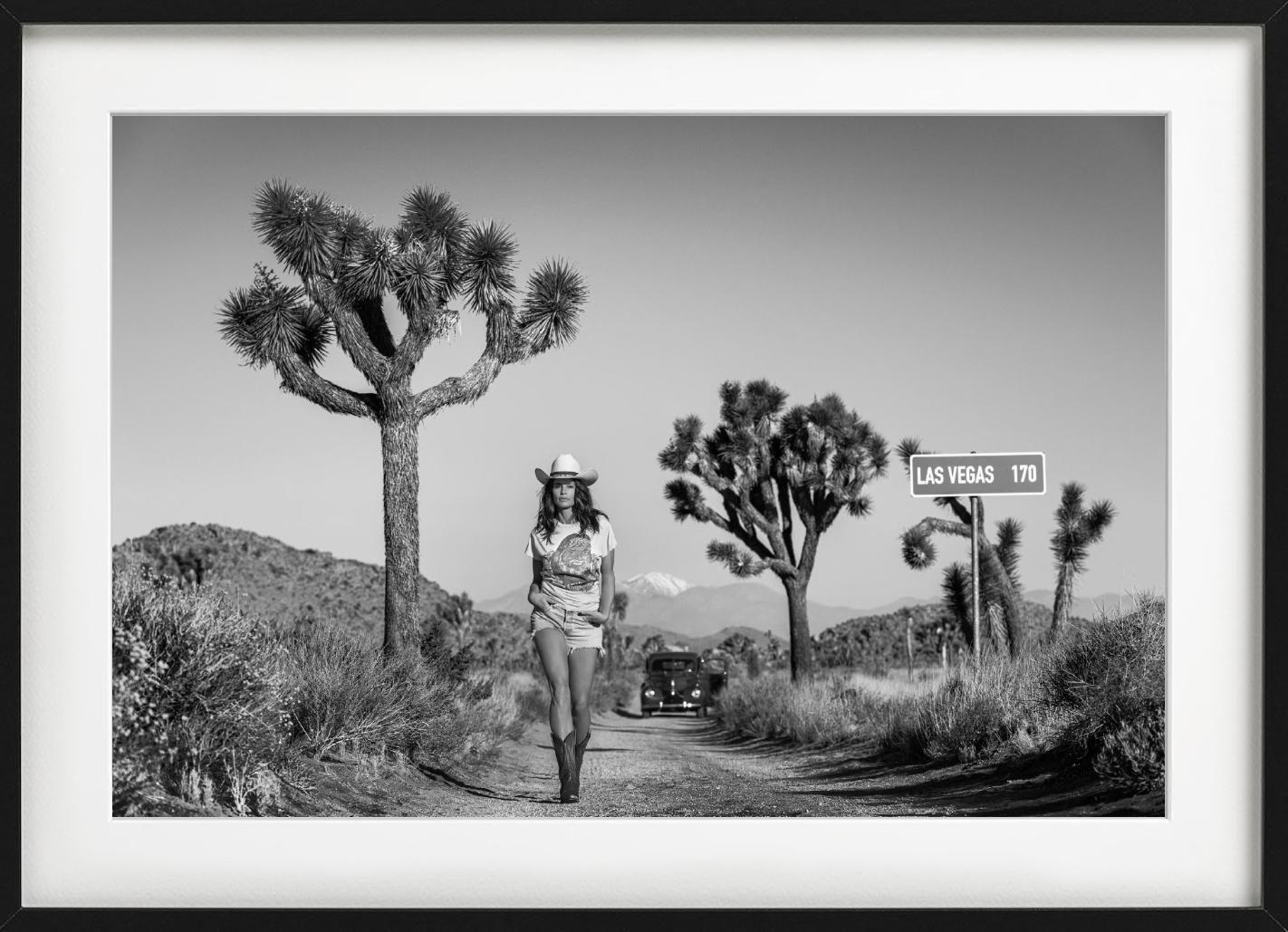 Sin City - Supermodel Cindy Crawford Walking in the desert, Joshua Tree - Photograph by David Yarrow