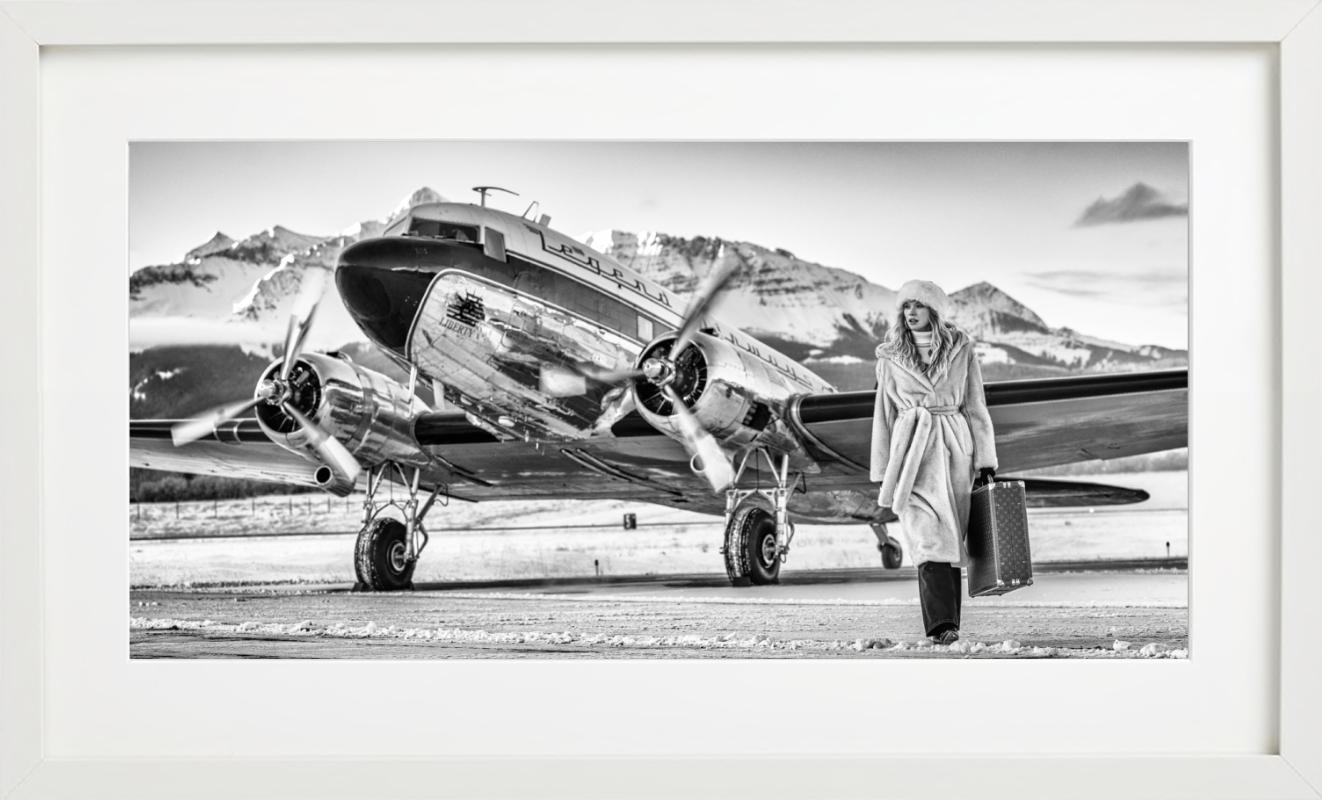 'Telluride' - silver airplaine and model in furcoat, fine art photography, 2023 - Photograph by David Yarrow