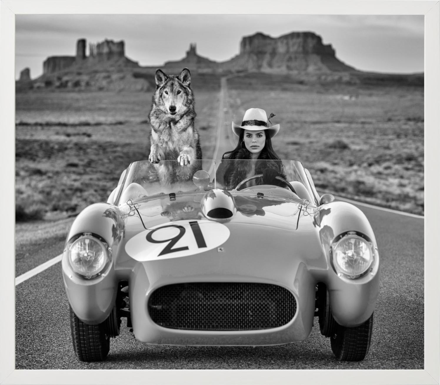 'Testarossa' - model and wolf in a ferrari, fine art photography, 2023 - Gray Black and White Photograph by David Yarrow