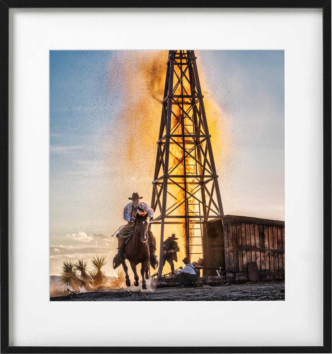 The golden age of Oil - cowboy in front of oil derrick, fine art photography For Sale 1