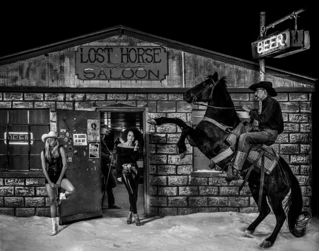 David Yarrow Black and White Photograph - The Lost Horse Saloon