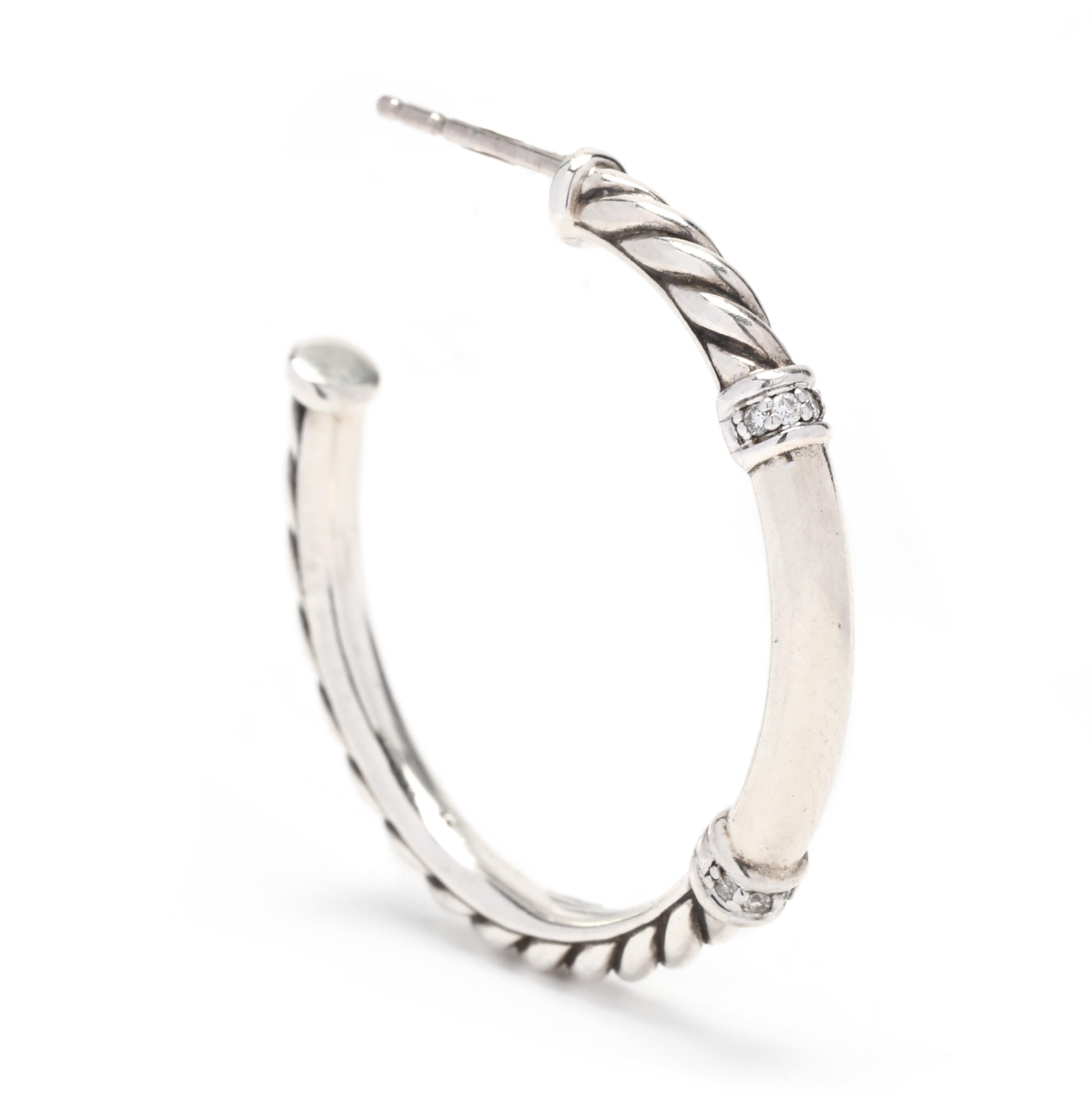 These stunning David Yurman .08ctw Diamond Metro Hoop Earrings are the perfect way to add a touch of sparkle to any outfit. Crafted in sterling silver, each earring measures 1.25 inches in length, and features a single row of glittering diamonds