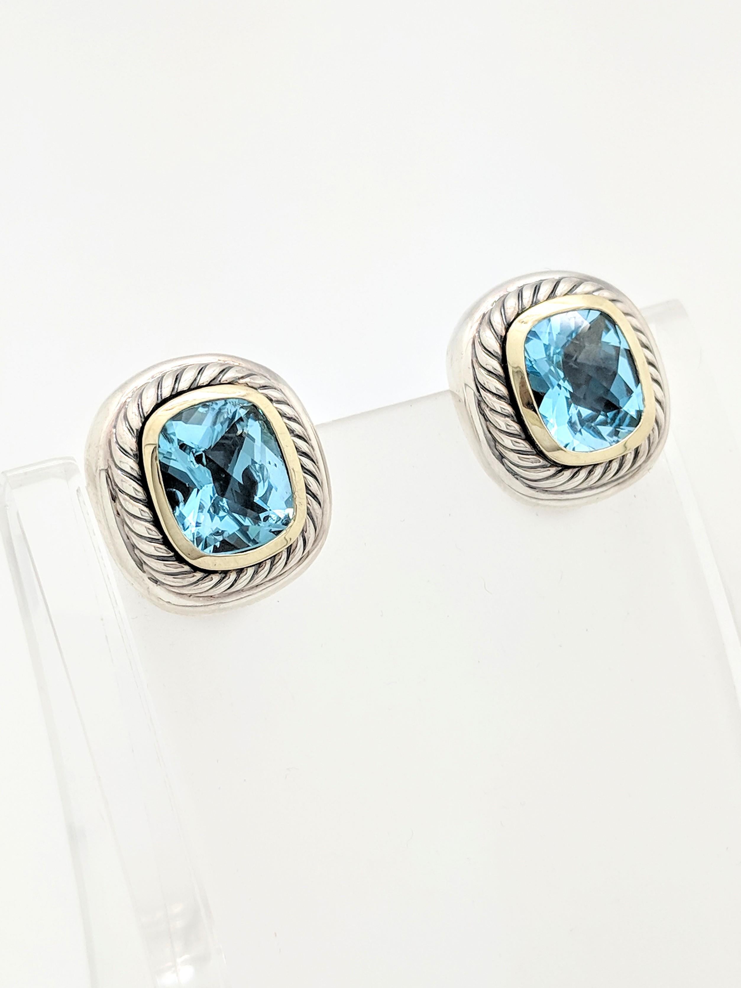 David Yurman 11mm Blue Topaz Albion Earrings

You are viewing a pair of authentic David Yurman 11mm Blue Topaz Albion earrings. Featured in Two Tone, Sterling Silver & 14k yellow gold. This is a discontinued style from David Yurman, although similar