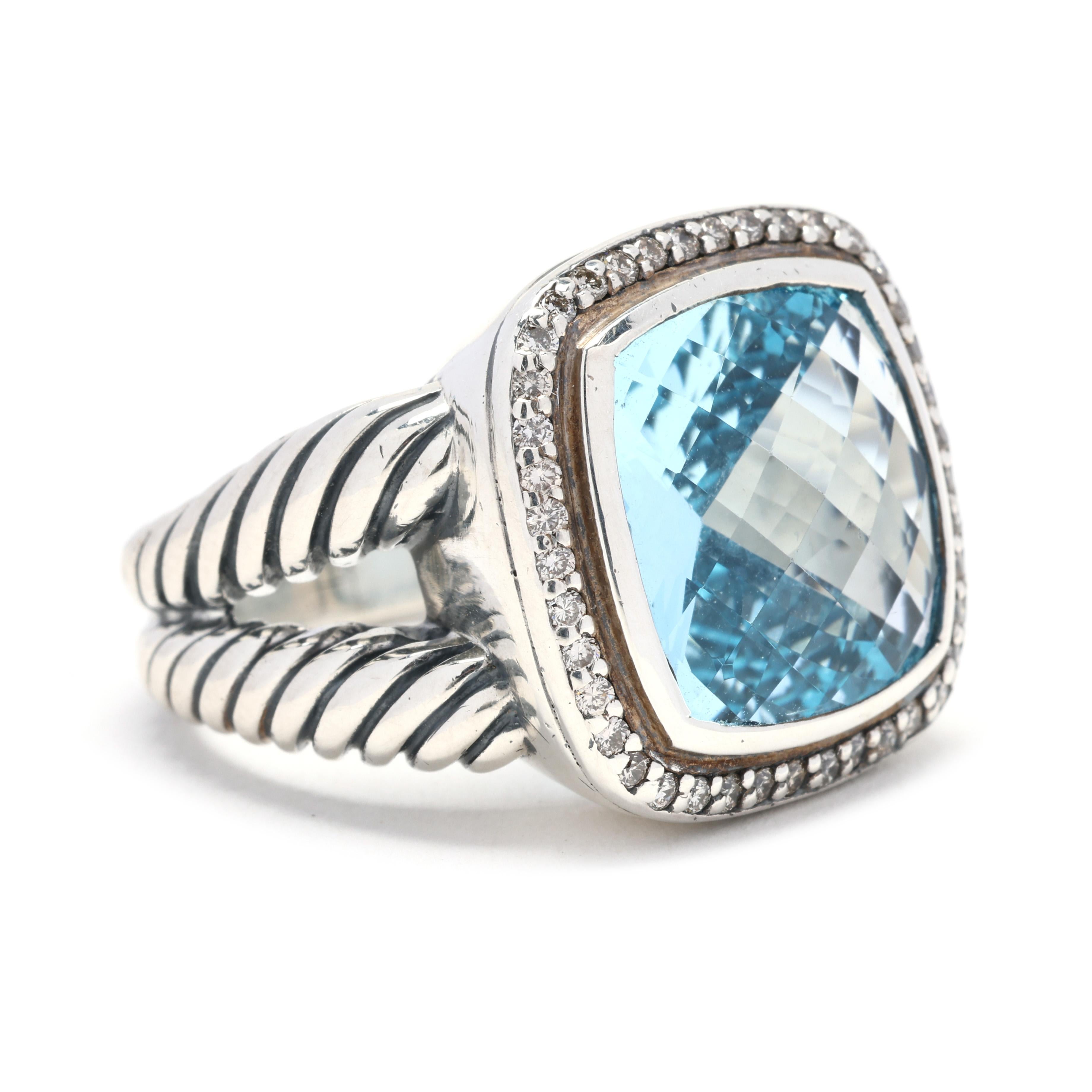 Questo magnifico anello con topazio blu e diamanti da 13,85 carati di David Yurman è un vero e proprio pezzo forte. L'anello è realizzato in argento sterling con accenti in oro bianco 18 carati, creando un bellissimo contrasto. Il centro dell'anello