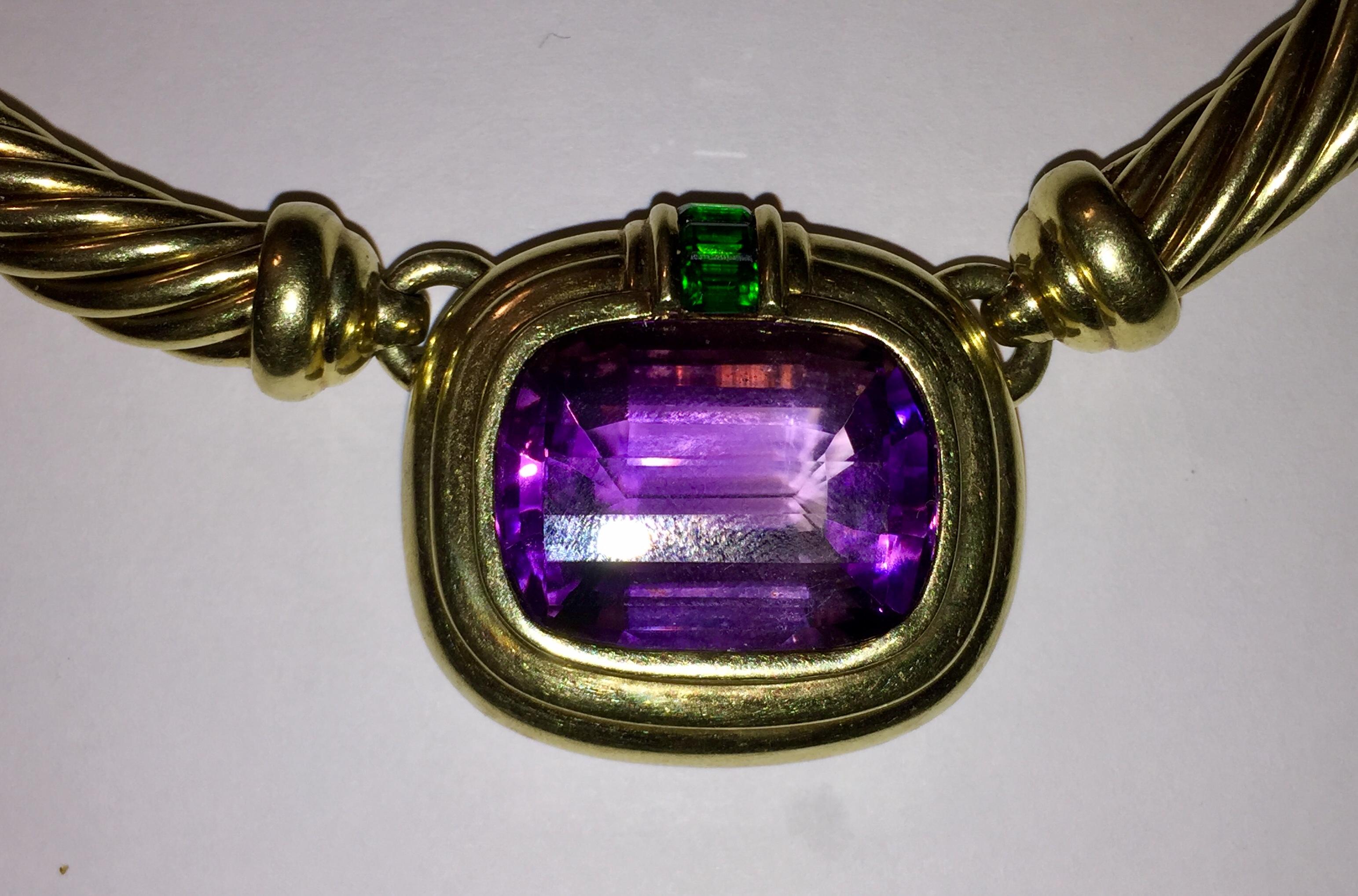 14 karat yellow gold David Yurman cable necklace with large amethyst and green tourmaline baquettes. Center is 1.5” long by 1.25” height. Marked, D.Yurman C, 14 K .Internal diameter of 4.5” and 16