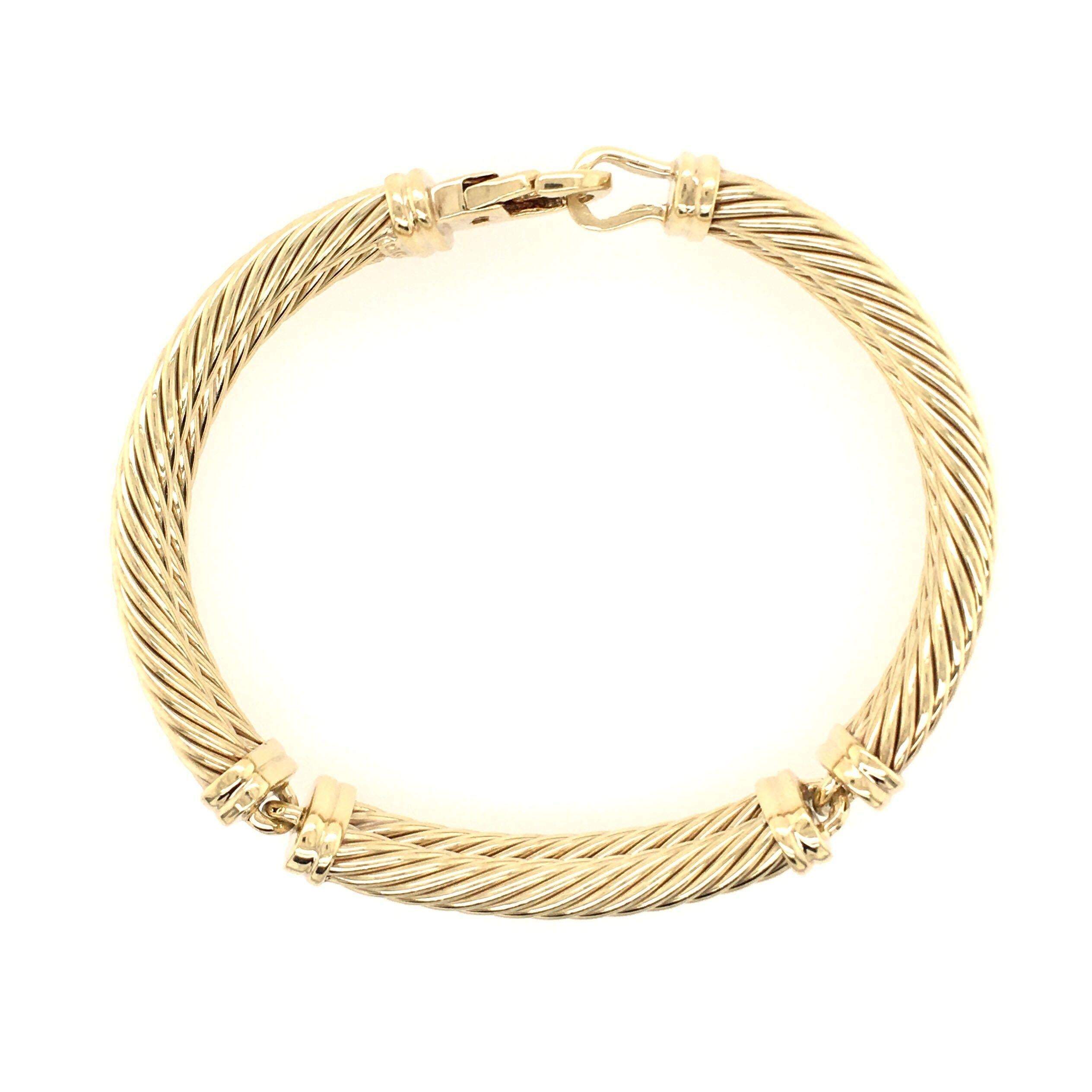 A 14 karat yellow gold bracelet. David Yurman. Designed as curved ropework links. Length is approximately 7 inches, gross weight is approximately 38.2 grams. Stamped D.Y. for David Yurman, 14K.