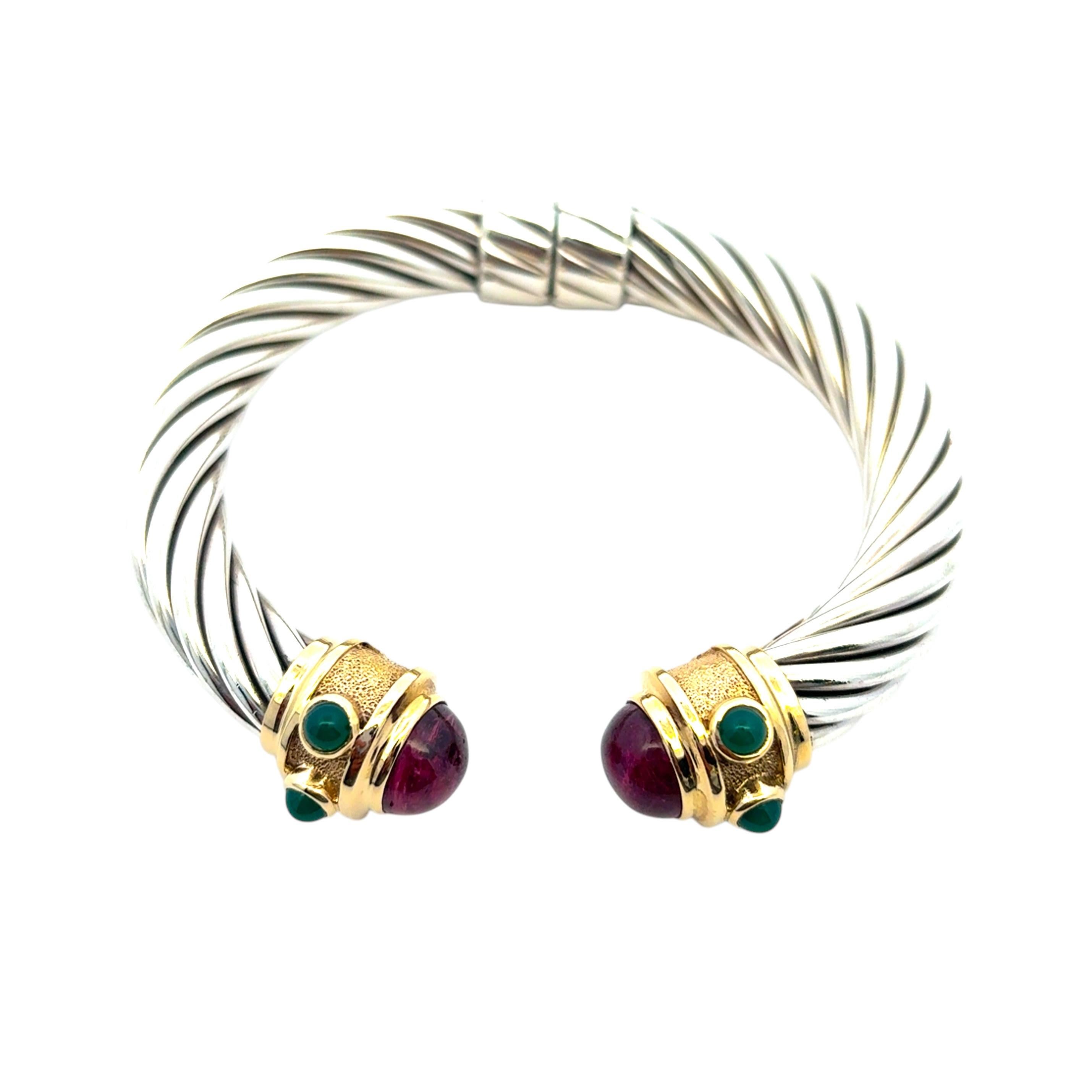 Designer	David Yurman
Materiale	Oro giallo 14k e argento sterling
Dettagli sulle pietre preziose	Ametista e Crisofrasio
Taglio della pietra preziosa	Cabochon
Peso totale	58,3g/37,5dwt
Misure del bracciale	Si adatta a un polso da 6
Circonferenza