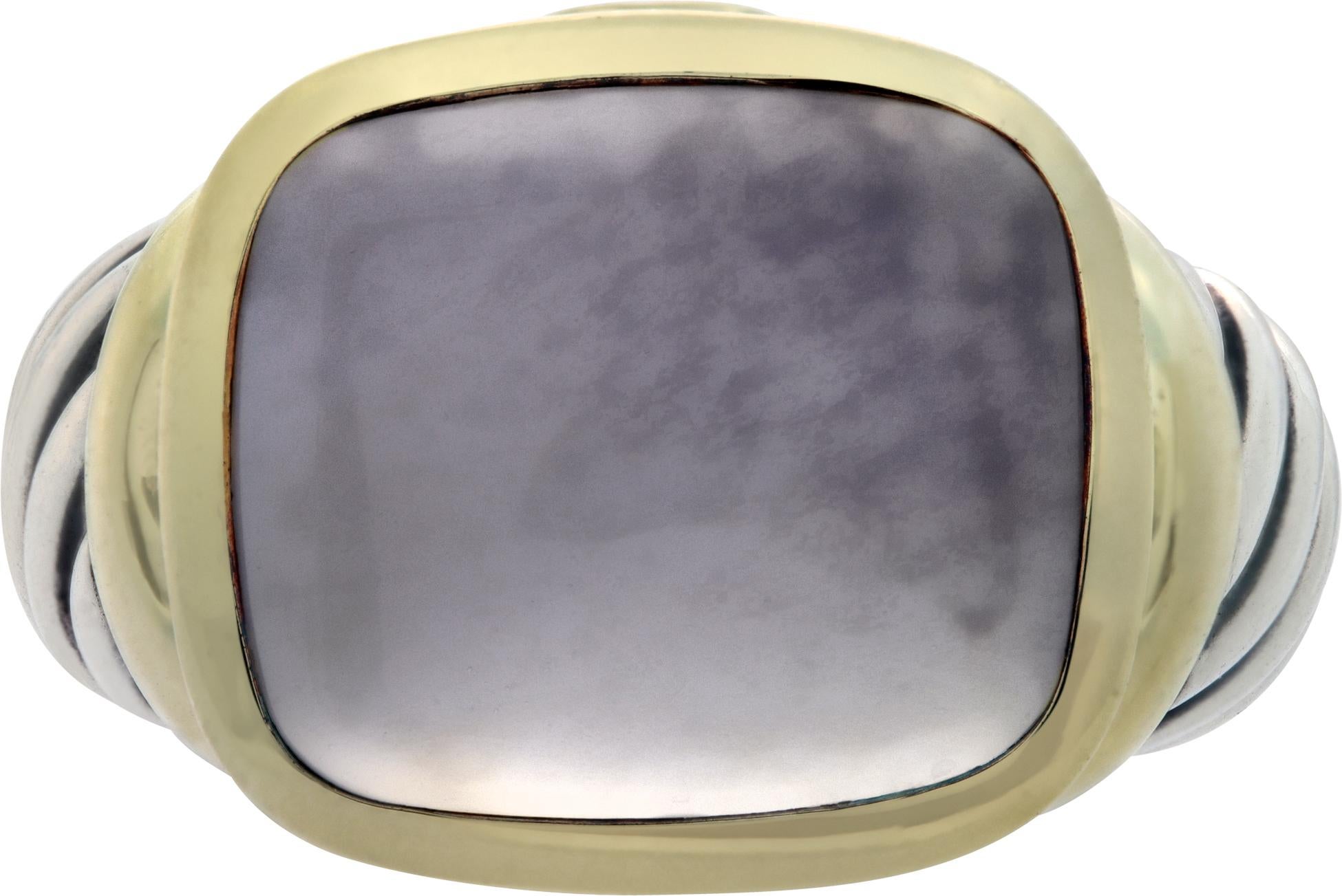 David Yurman 14K yellow gold and sterling silver with a cabochon calcedony.

This David Yurman ring is currently size 6.5 and some items can be sized up or down, please ask! It weighs 6.9 pennyweights and is 14K & STERLING SILVER.
