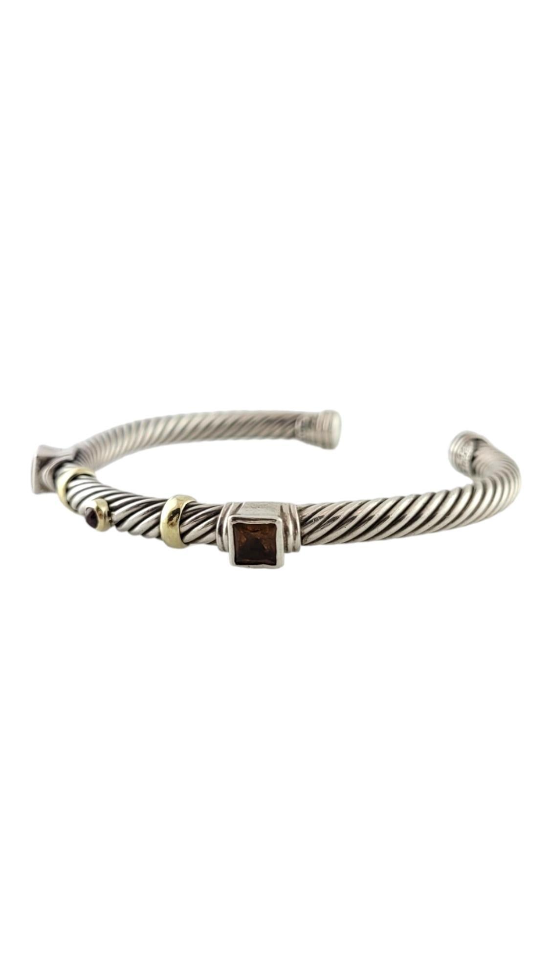 David Yurman 14K Yellow Gold & Sterling Silver Renaissance Cable Cuff Bracelet with Citrine & Tourmaline

This gorgeous bracelet by designer David Yurman is crafted from sterling silver with 14K yellow gold detailing. This piece also features 2