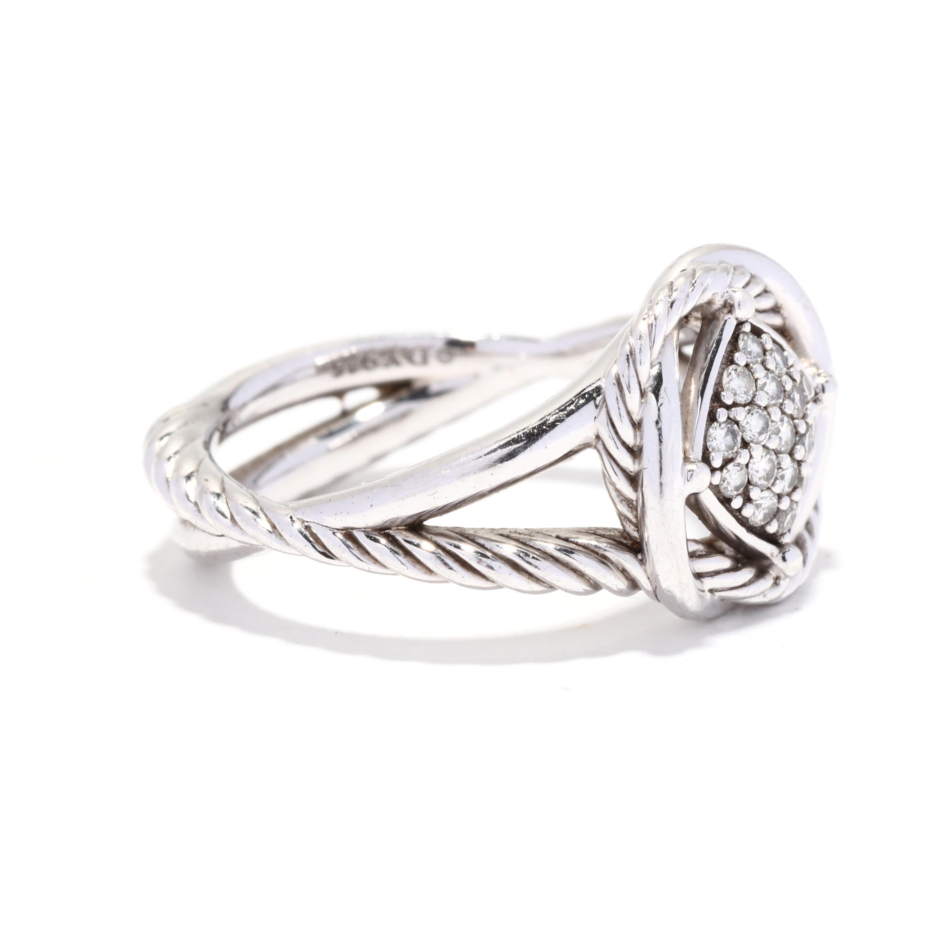 A David Yurman sterling silver and diamond Infinity ring. This everyday ring features a cushion en pointe center set with pavé diamonds weighing approximately .15 total carats with a twist surround and a split band with a polished and cable