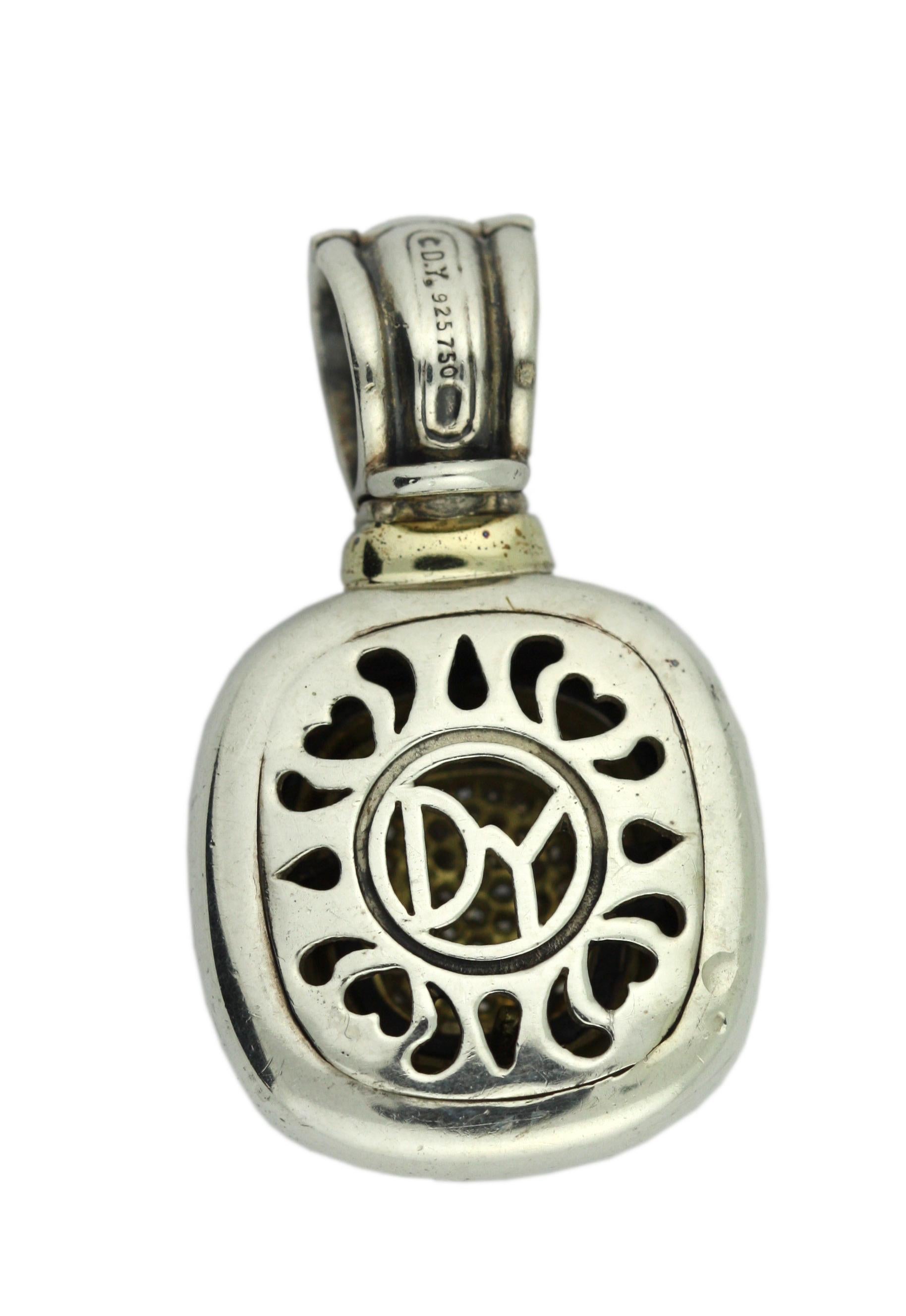 David Yurman
18 karat Gold and Silver Pendant
length 1 1/2 inches, gross weight 20 grams,
initialed D. Y, stamped: 925 750