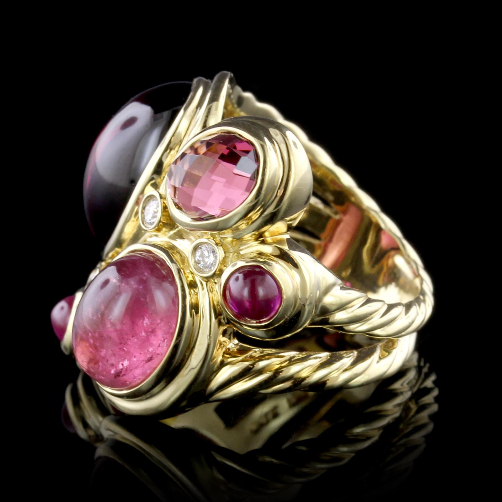 David Yurman 18K Yellow Gold Pink Tourmaline, Rhodolite Garnet and Diamond
Mosaic Ring. The ring is set with various colored pink toumalines and garnet,
further set with four full cut diamonds, approx. total wt. .11cts. size 7.