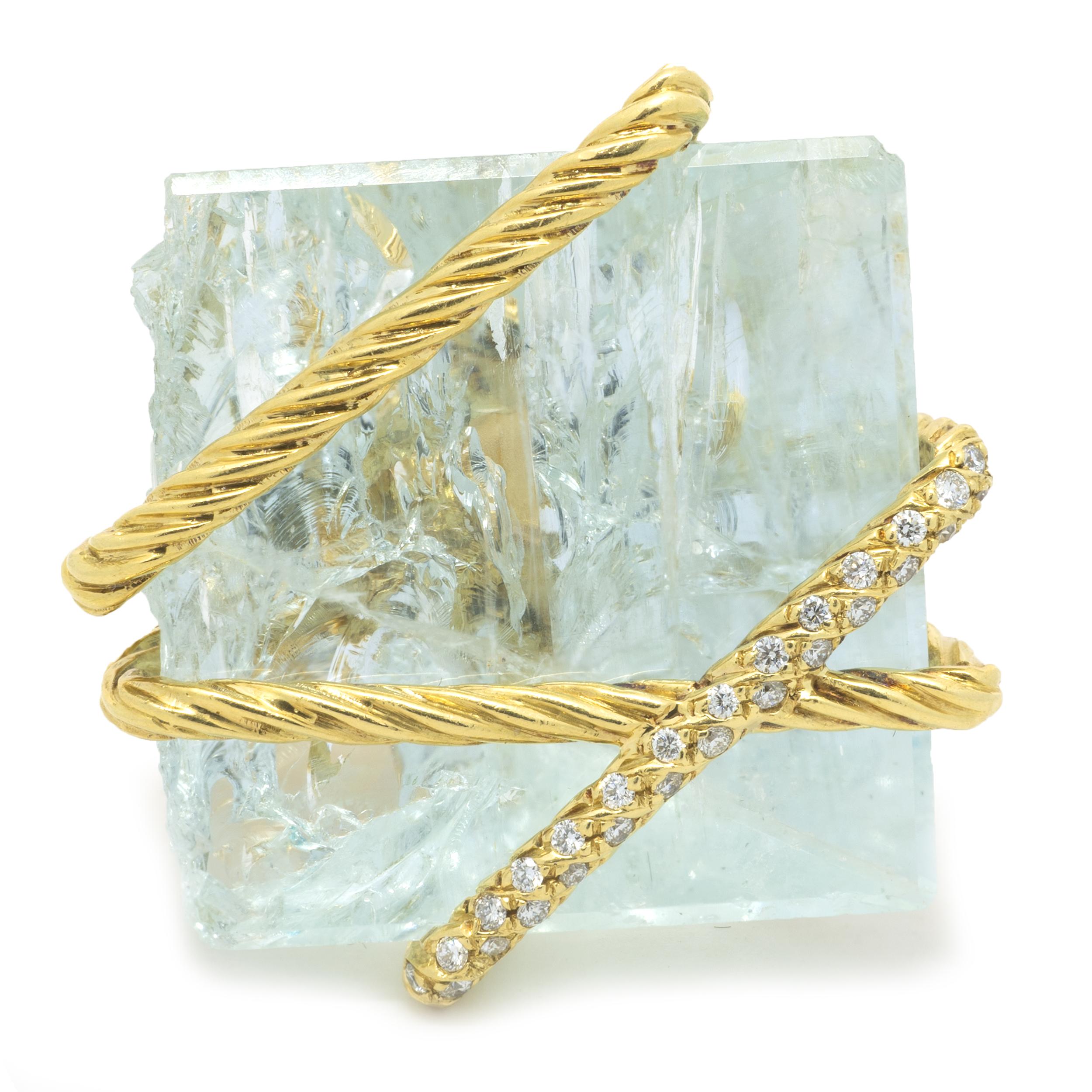 Designer: David Yurman
Material: 18 Karat Yellow Gold
Diamond: 20 round cut = .20cttw
Color: G
Clarity: VS1
Aquamarine: 1 natural square cut = 45.00ct
Color: Fine Gem Quality
Clarity: AAA
Dimensions: ring measures 27mm wide
Weight: 32.00 grams
Size: