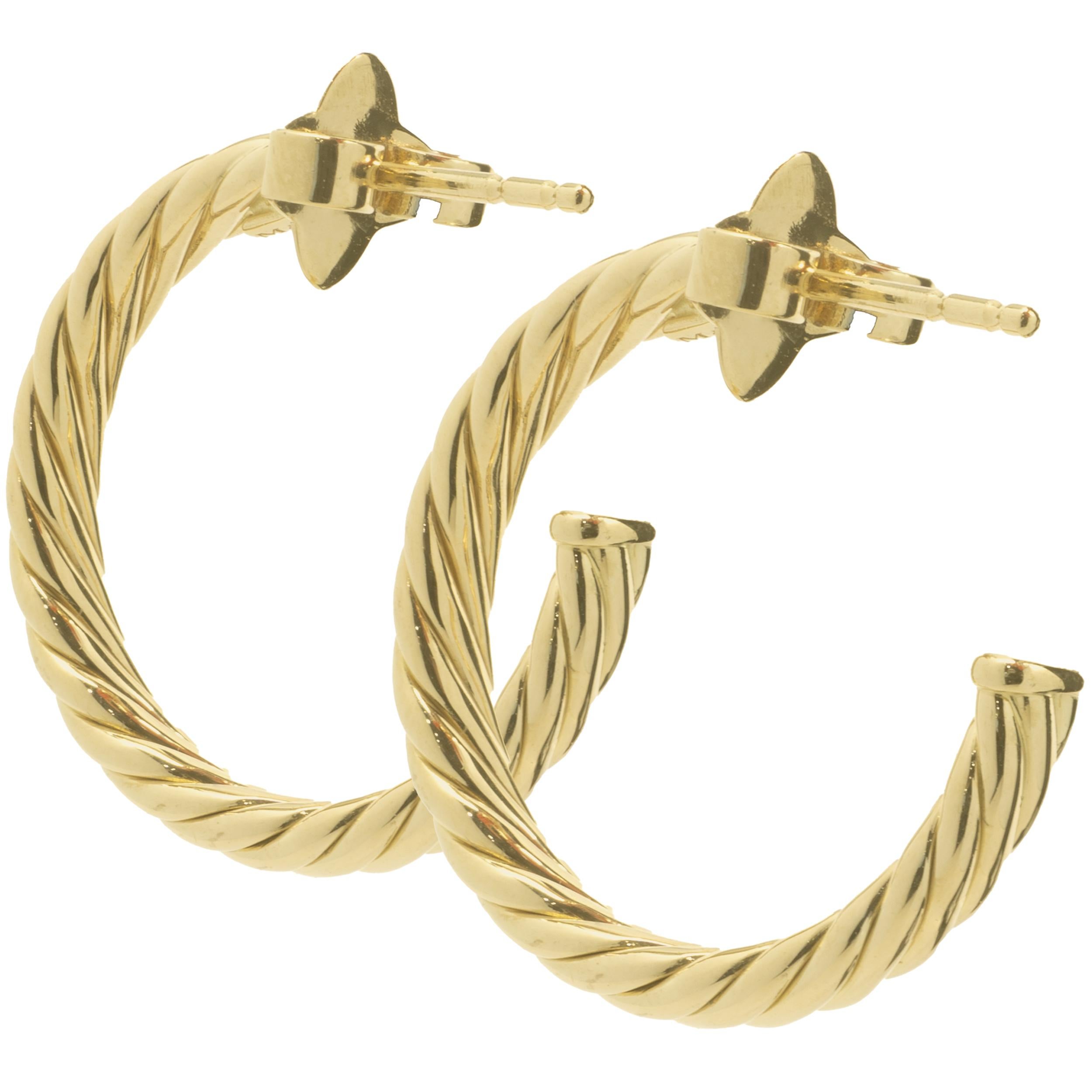 Designer: David Yurman
Material: 18K yellow gold 
Dimensions: hoops measure 23mm in diameter
Weight: 4.85 grams
