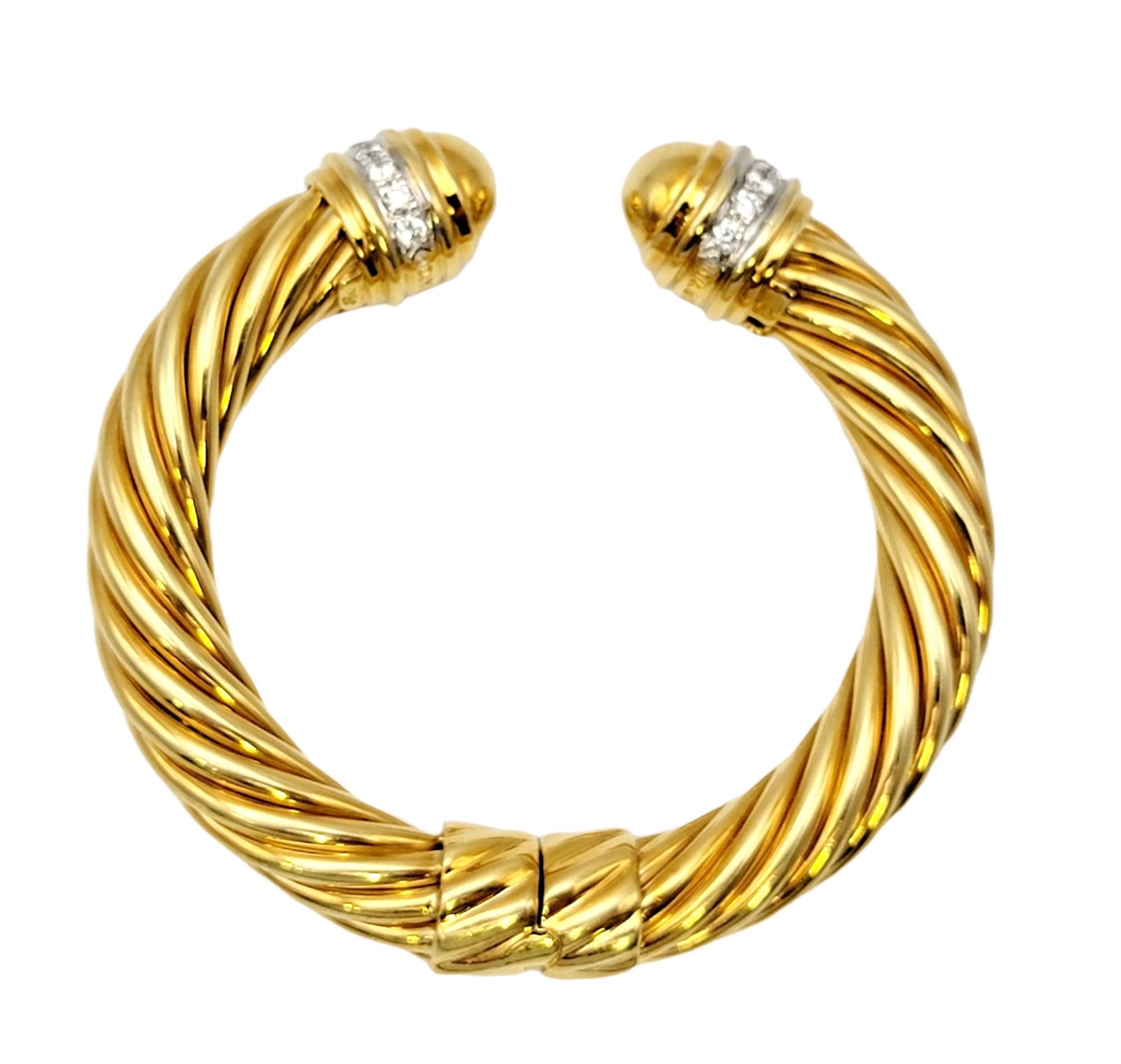Beautiful modern cuff bracelet by popular designer, David Yurman. This contemporary piece can be stacked with other bracelets for a more fashion-forward look, but is certainly substantial and lovely enough to wear on its own. The hinged bracelet is