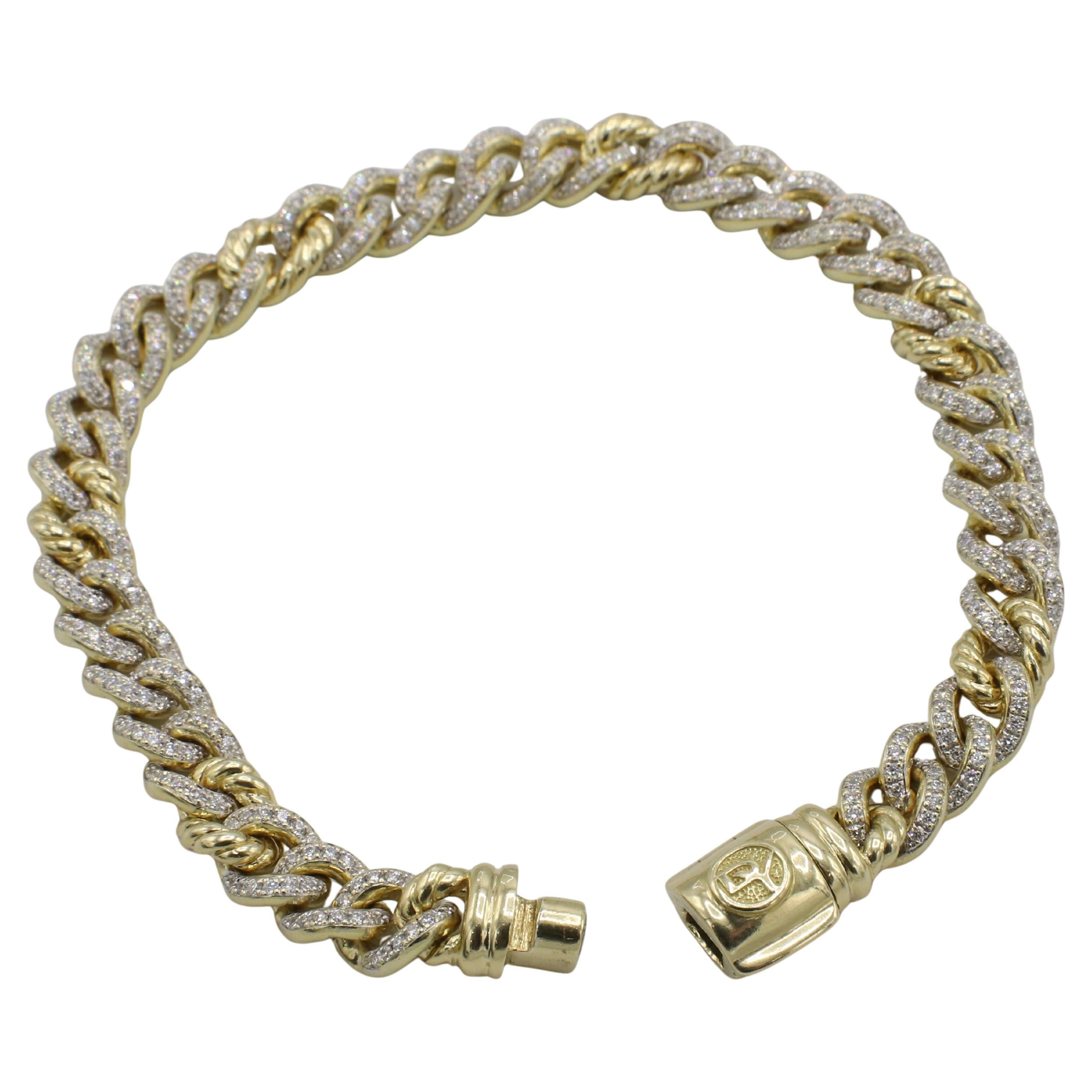 David Yurman 18 Karat Yellow Gold Natural Diamond Cuban Curb Chain Link Bracelet 
Metal: 18k yellow gold
Weight: 31.9 grams
Diamonds: 372 round natural diamonds, approx. 2.00 CTW F-G VS-SI diamonds
Length: 7 inches (fits up to a 6.5 inch wrist