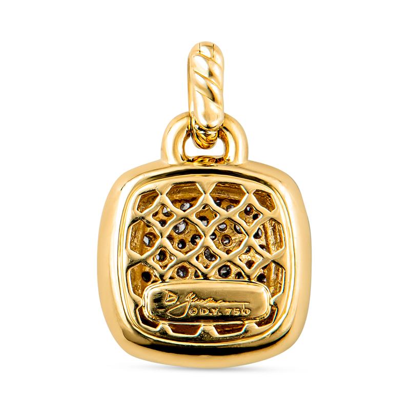 This pendant from David Yurman features 0.73 in pave-set round diamonds set in 18 karat yellow gold on a cable bail. It can be attached to a necklace or bracelet.The original MSRP is $4,150. 
Dimensions: Approximately 15.3mm
Condition: Excellent.