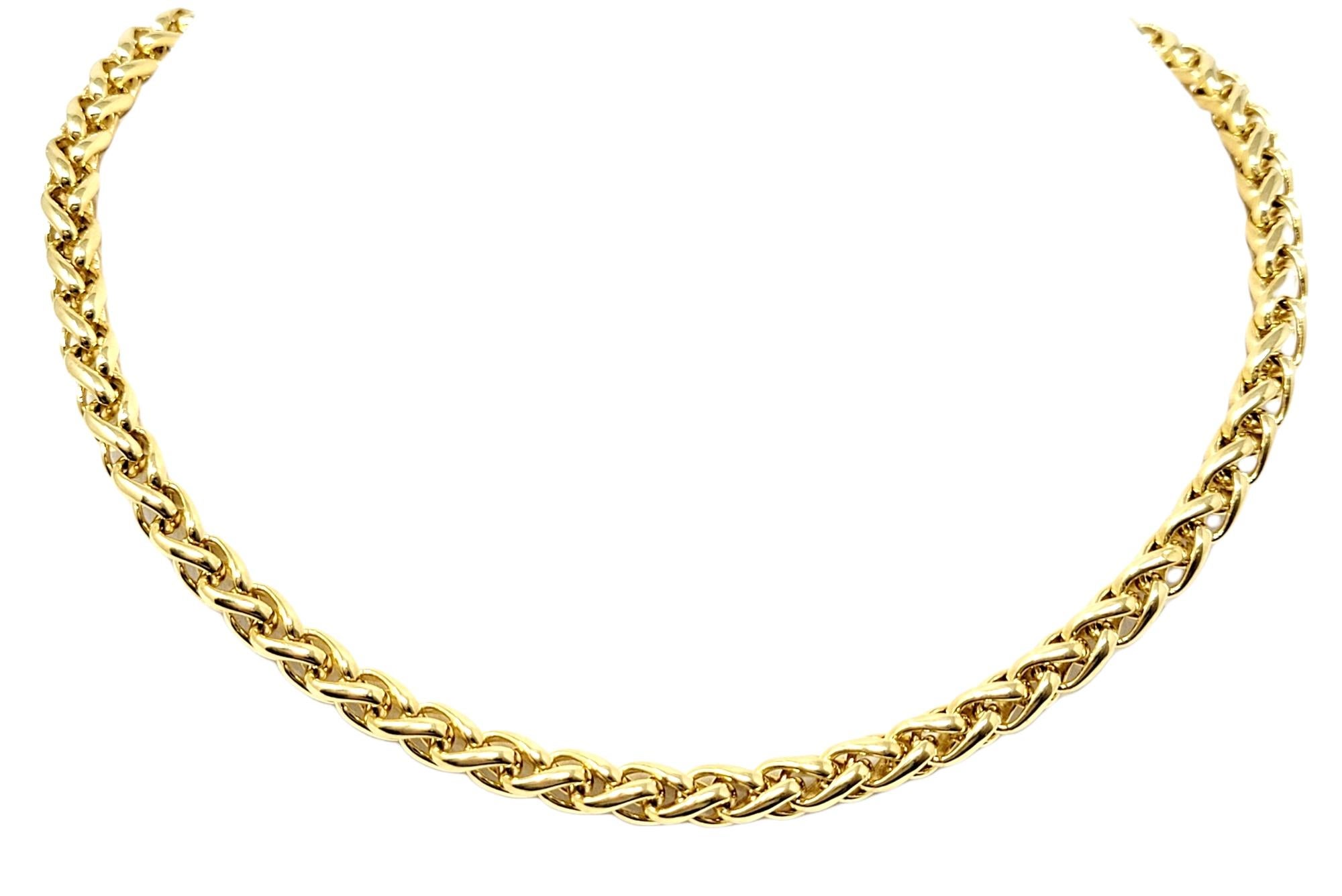 Simple yet elegant 18 karat yellow gold wheat chain necklace by designer David Yurman. This versatile piece can be dressed up or down and worn with just about everything. The flexible design gently hugs the neck, while the delicate diamond detailing