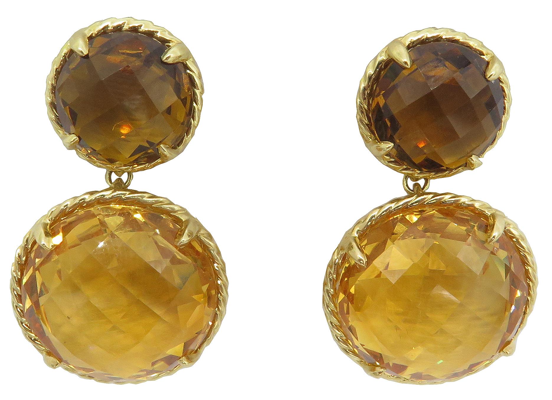 A 18K yellow gold double-drop earrings from David Yurman's Chatelaine collection set with two Citrine stones. The neutral shade of the stones matches everything! You can wear it with a suit, fancy dress, or everyday. Also, featuring great sturdy