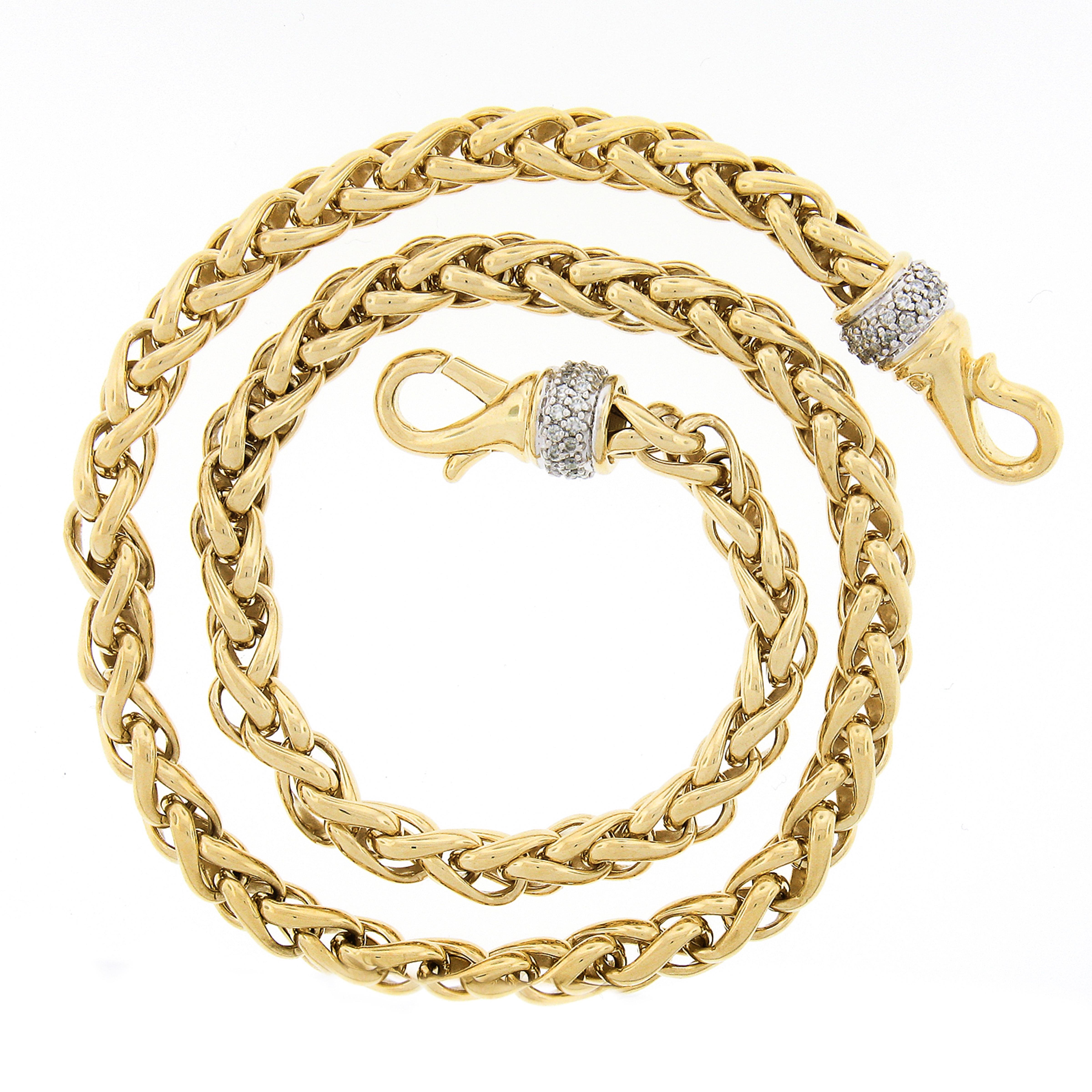 Here we have a gorgeous and well made chain necklace by David Yuramn crafted in solid 18k yellow gold featuring a wide wheat link design with a nice high polished finish throughout. This solid chain measures 16 inches in length and 6mm wide with a