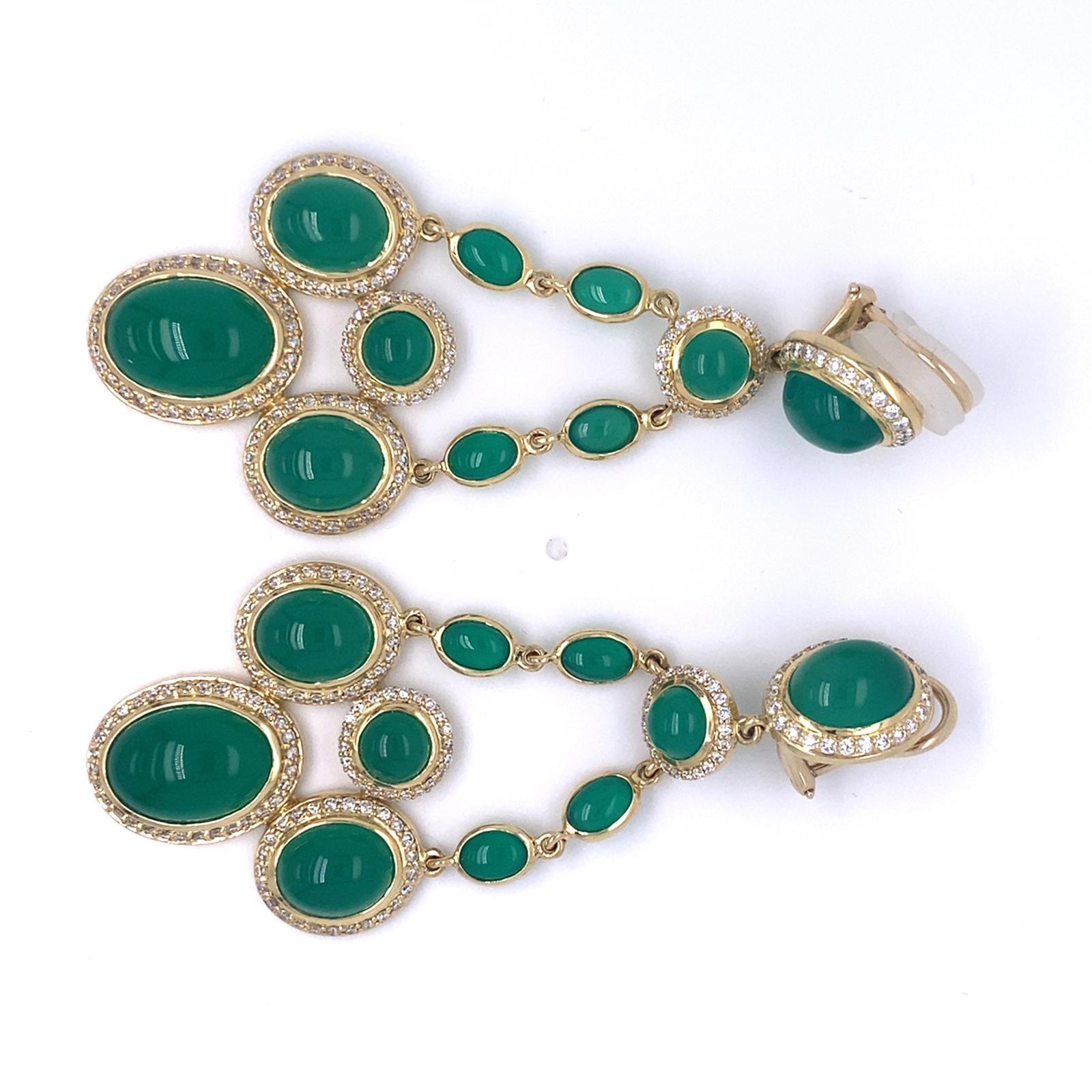 Features a pair of Yellow Gold, Diamond, and Chrysoprase Chandelier Ear Clips
Brand: David Yurman
Set in 18k Yellow Gold
Diamond Carat Weight: Appx 4.46 carats
Gross Weight: 38 grams
Length: 3 inches
NOTE: Backs have been modified from posts to