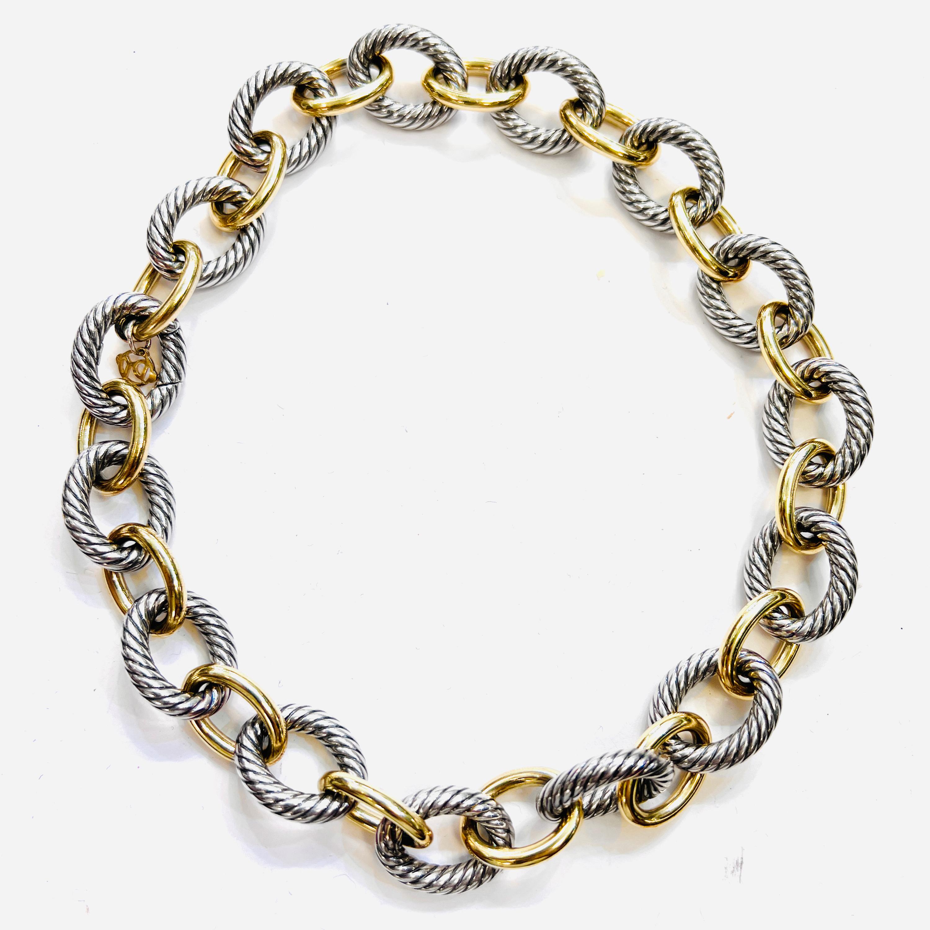 David Yurman 18K Gold and Sterling Silver Extra-Large Oval Link Necklace

Sterling Silver Bonded with 18-karat Yellow Gold 
Silver links are 23mm. Gold links are 20mm. 16 inches length
Lobster clasp

MSRP: $4,125.00.
Signed David Yurman