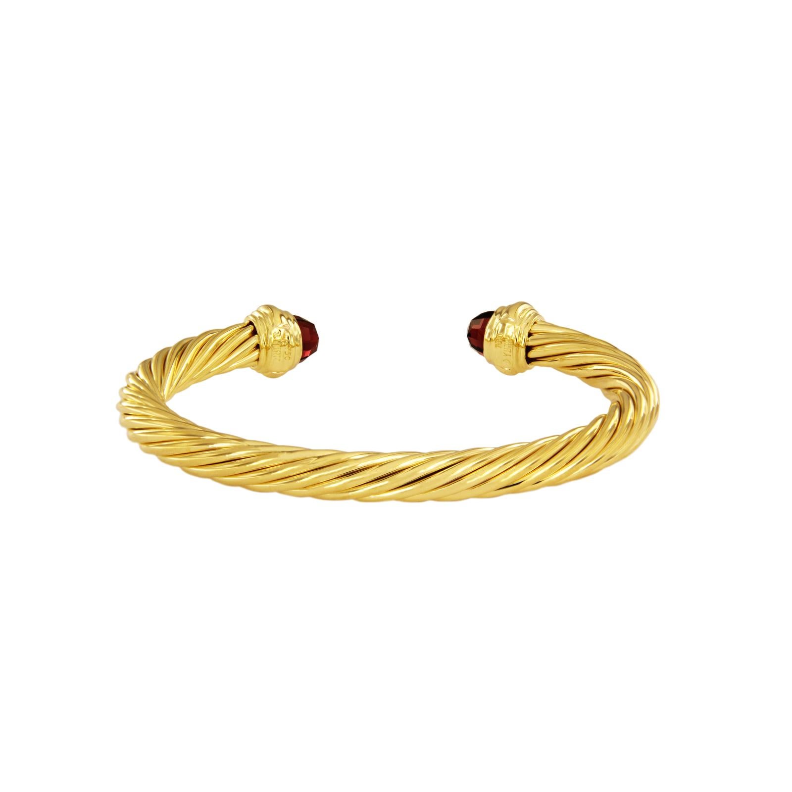 RARE DAVID YURMAN 18K GOLD CABLE CLASSICS BRACELET WITH GARNET.

-Mint condition
-18k Yellow Gold
-Faceted Garnet
-Medium size
-Width: 6.5mm
-Weight: 25.6gr

*Includes David Yurman box.
Original Retail: $3,500