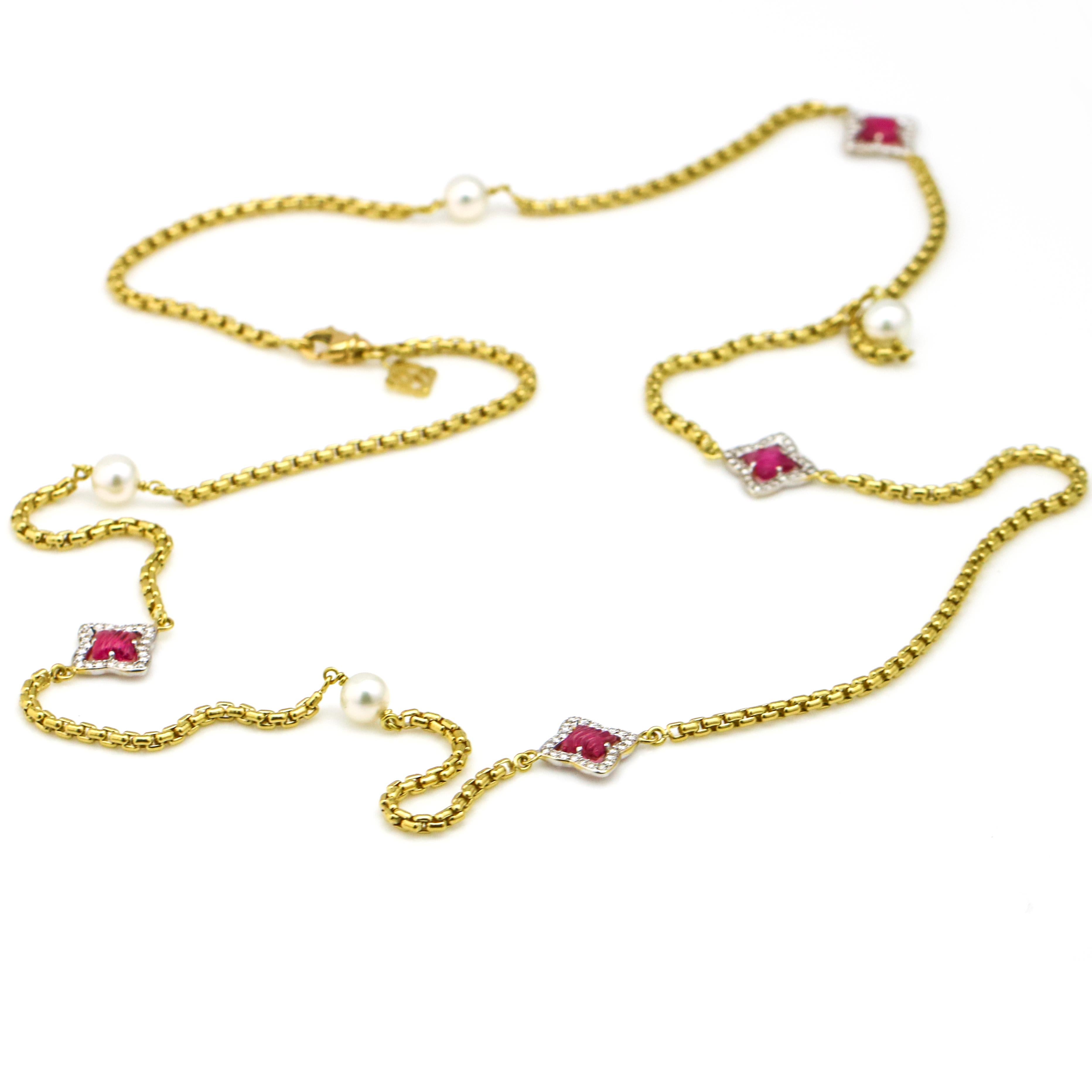 David Yurman Quatrefoil station necklace crafted in 18 karat yellow gold. Classic Yurman box chain with Quatrefoil links and pearls stations. The quatrefoil links have diamonds and a pink tourmaline at center. Pearl diameter, 7mm. Lobster clasp.