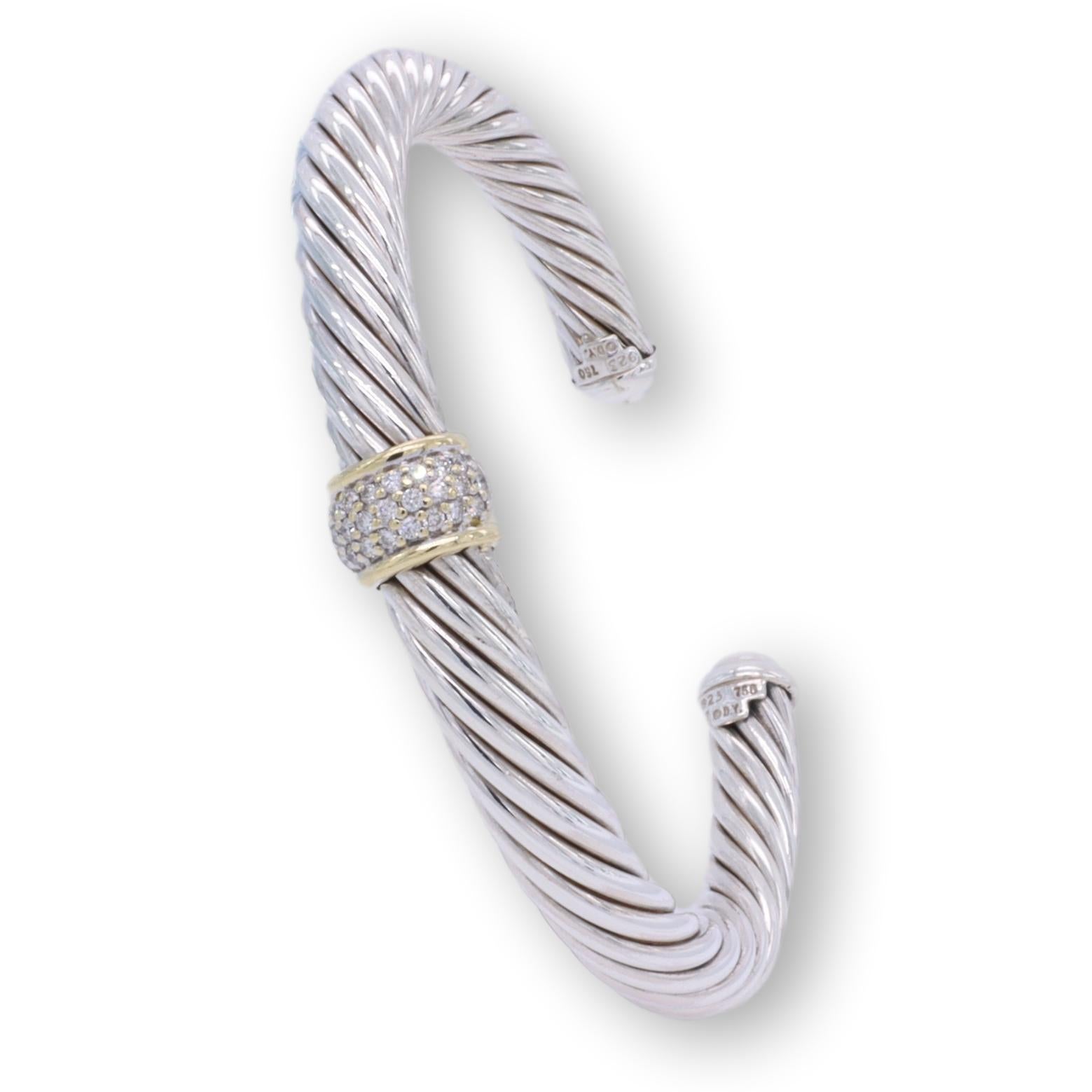 David Yurman Slip on two tone open cuff bangle bracelet from the cable classics collection finely crafted in sterling silver featuring a station of pave set round brilliant cut diamonds 0.21 cts total weight approximately inside 2 strip details
