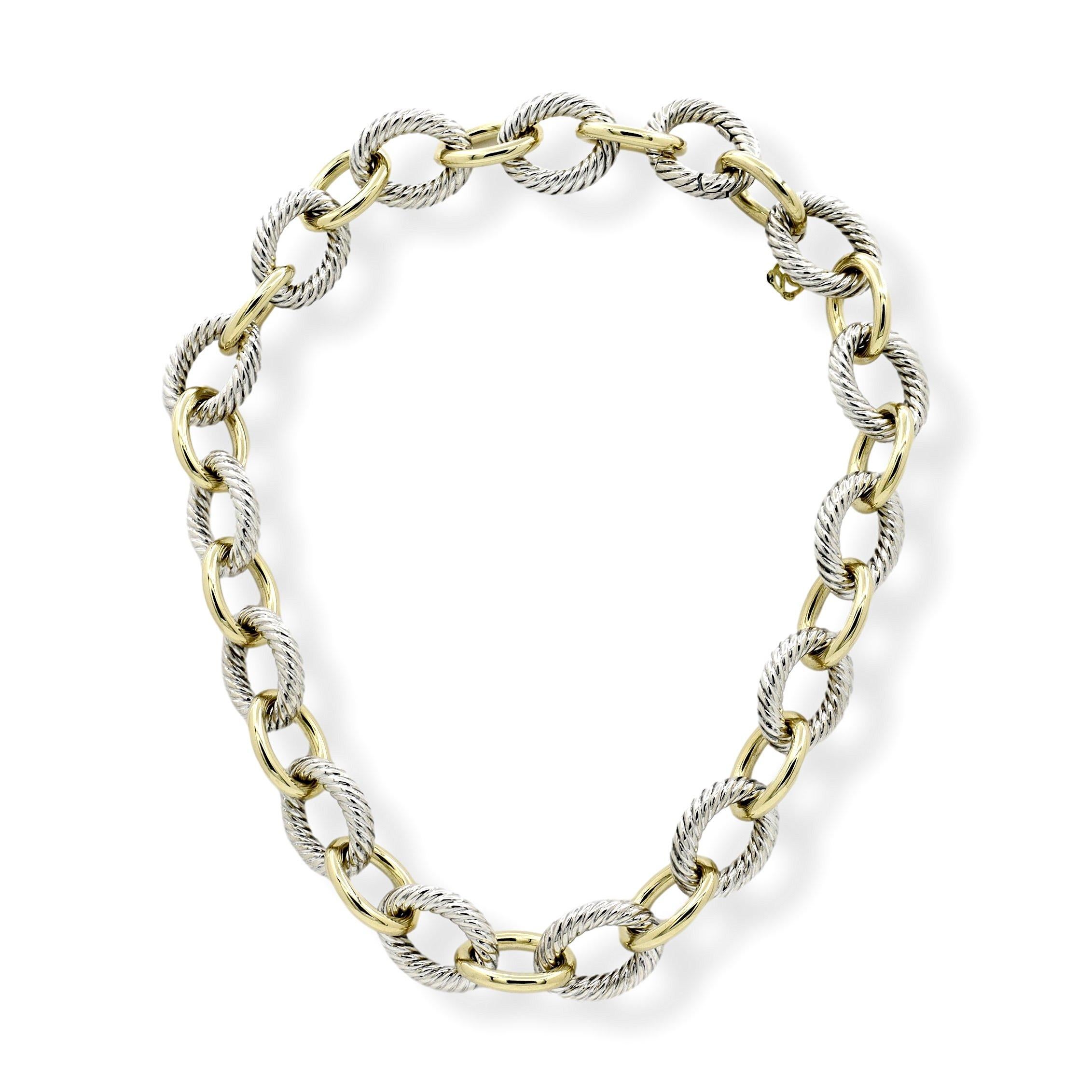 David Yurman necklace from the chain link collection with large interlocking oval links finely crafted in 18 karat yellow gold and sterling silver. Gold links have a smooth finish and silver links carry the iconic twisted cable finish measuring
