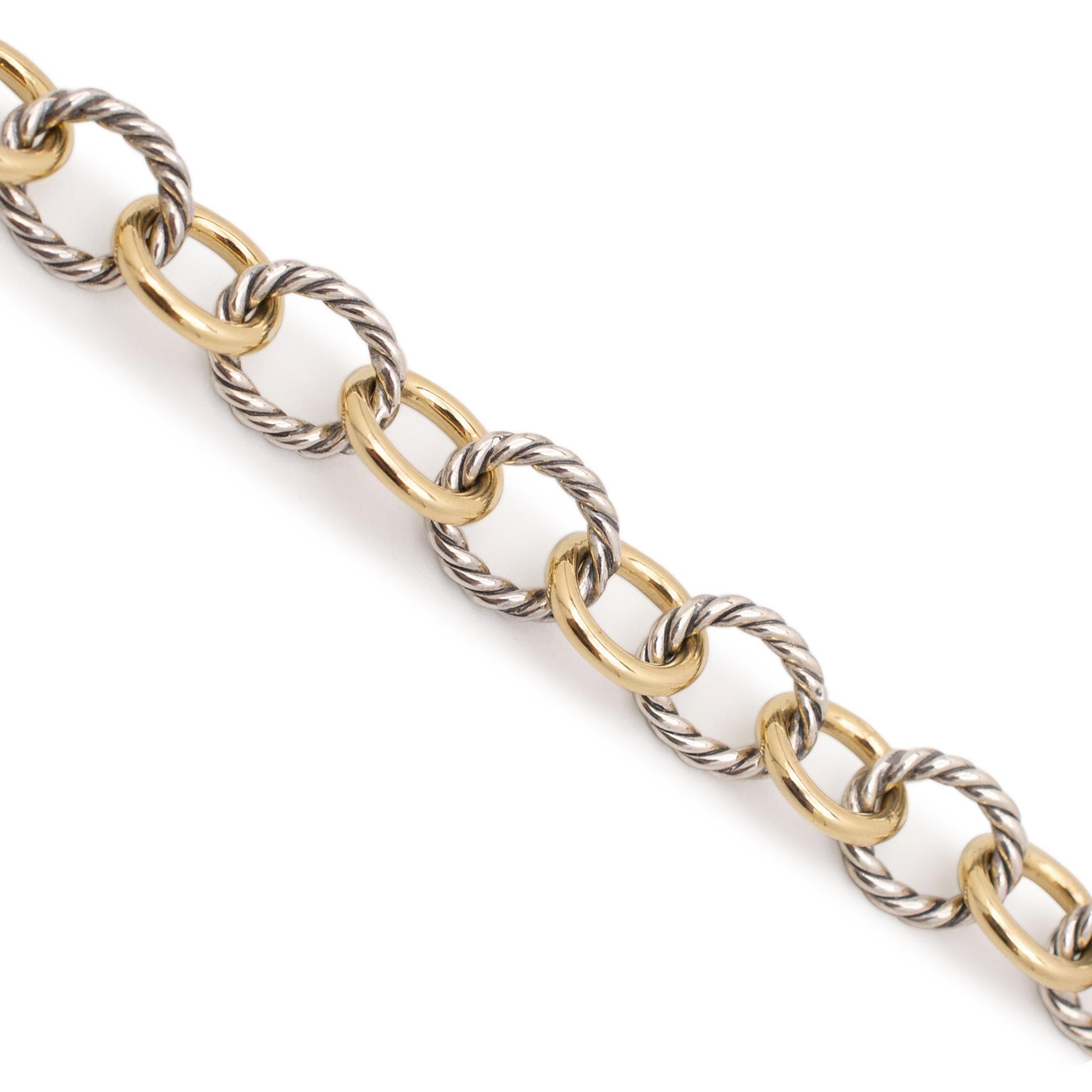 Brand: David Yurman

Metal Type: 925 Sterling Silver & 18K Yellow Gold

Gender: Unisex

Length: 6.75 Inches

Link Width: 8.45mm

Total Weight: 13.52 grams

Engraved with 