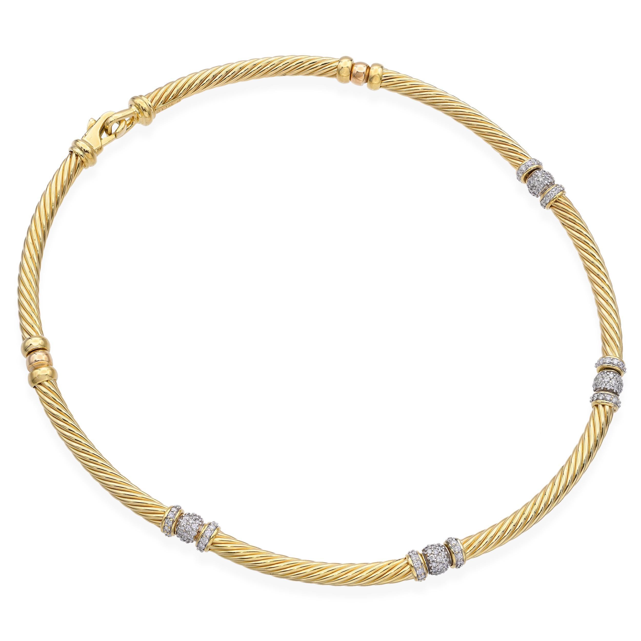 Crafted in rich 18k yellow gold, this vintage swivel link necklace features an elegant series of interlocking links that fluidly move with the wearer. Each link is accented with brilliant diamonds, adding a refined sparkle to the dynamic design. The